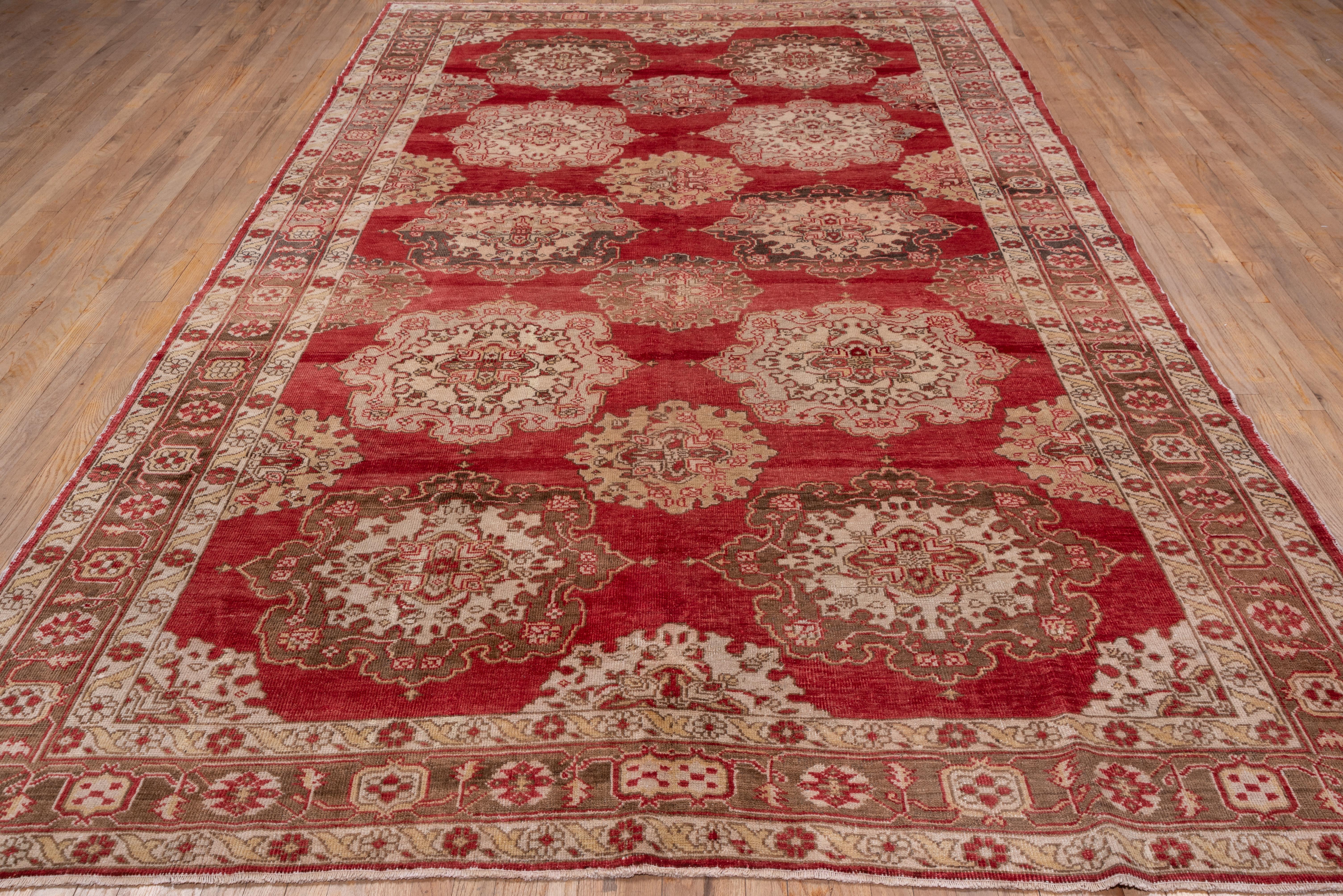 Hand-Knotted Red Antique Turkish Oushak Carpet with Allover Field For Sale