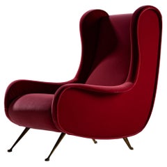Poltrona rossa, manifattura italiana, anni '60