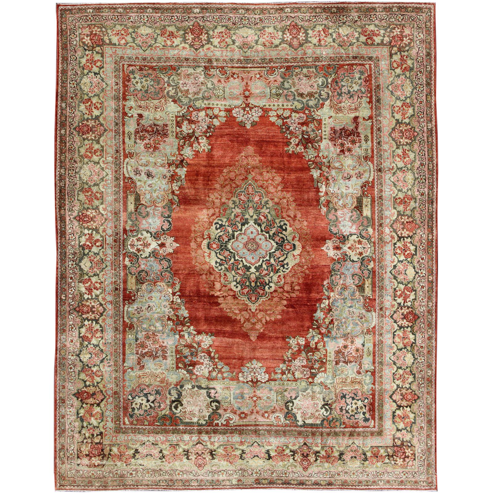 Persian Antique Mahal Rug with Beautiful Floral Design in Red, Pink, and Green For Sale