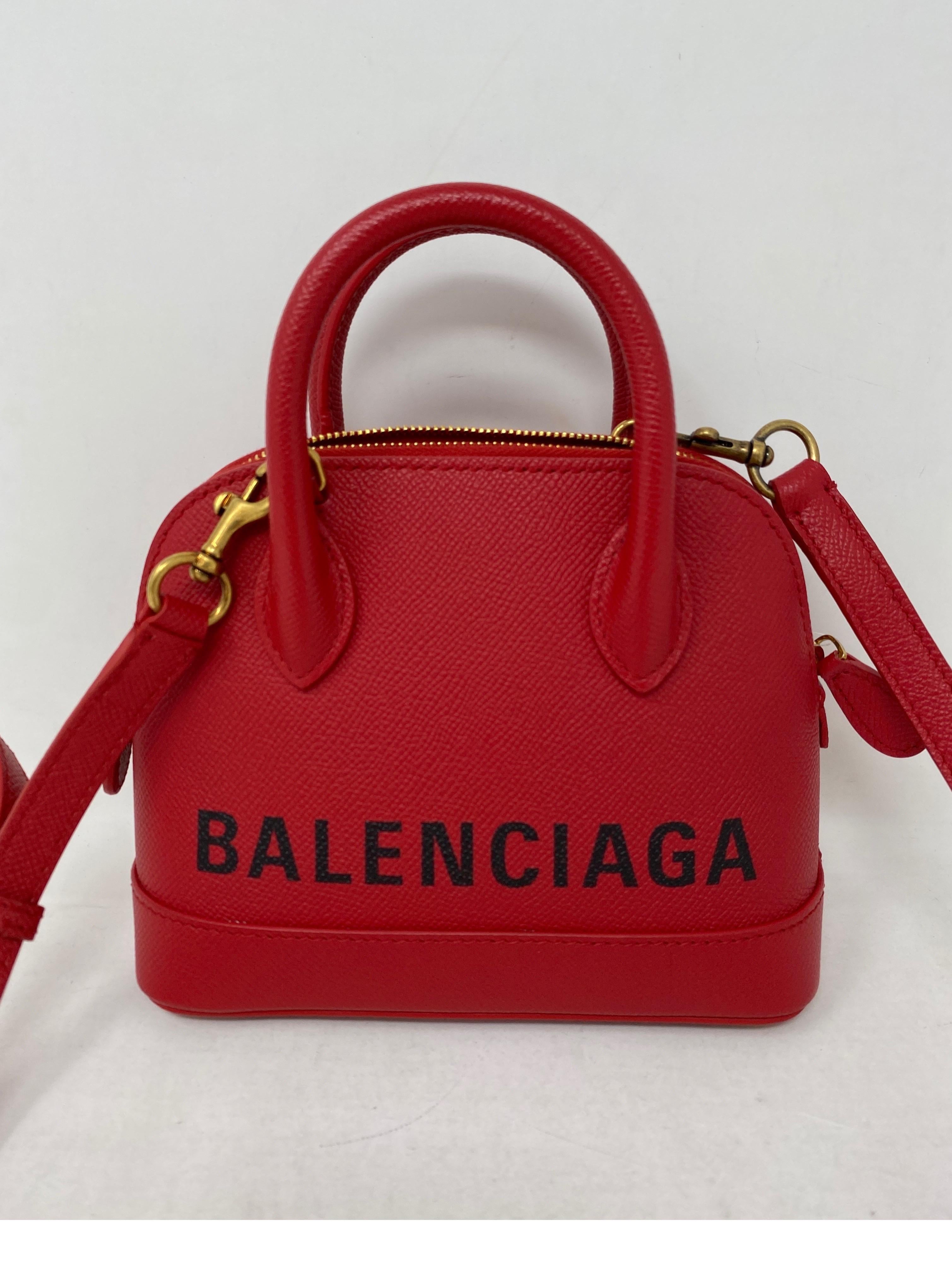 Red and Black Balenciaga Mini Bag. Crossbody or top handle mini bag. Mint like new condition. Very cute style bag. All leather. Includes dust cover. Guaranteed authentic. 