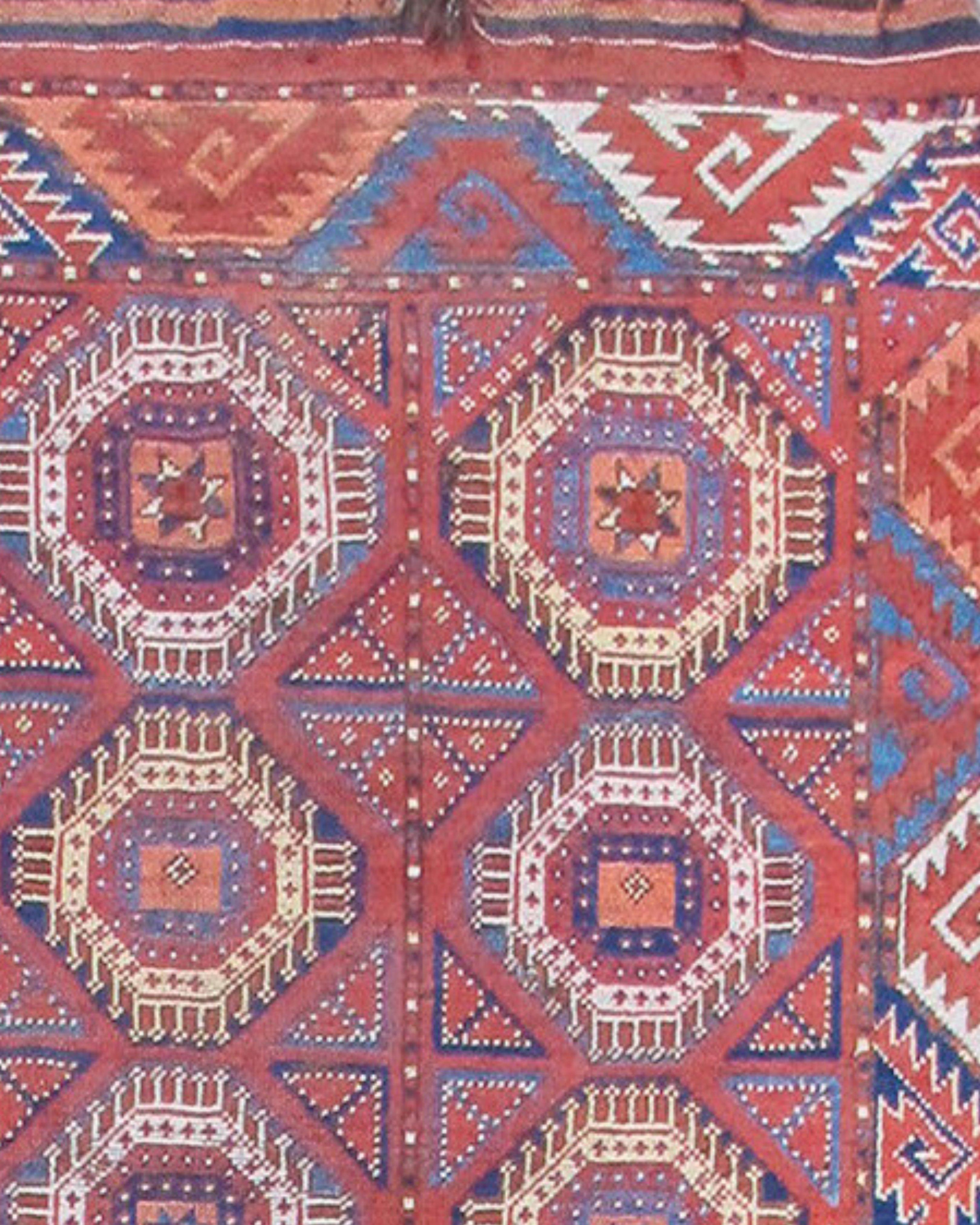 Red Bashir Ersari Long Rug with Tiled Octagons, 19th Century

Woven along the banks of the Oxus River in Central Asia, this long and narrow Bashir carpet represents a distinctive form of Turkmen weaving. The town Bashir is located in what is now