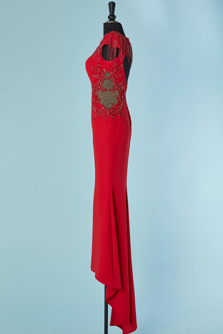 Vestido de noche rojo con cuentas y tul transparente Gai Mattiolo