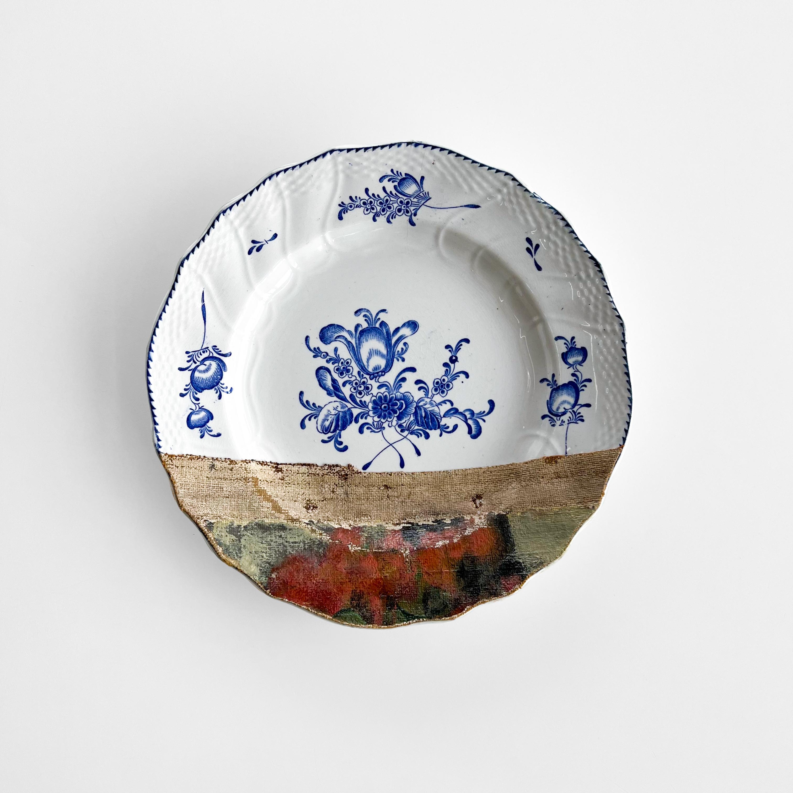 “Red Begonias” belongs to our “Altered Perspectives” series: assemblages of ceramic plates layered with a painting on canvas.
This artwork includes 3 European Blue & White plates from the 19th C. and 20th C.
The painting features a pot of red
