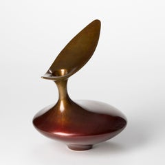 Red bird, an abstract red bronze sculpture by Vivienne Foley