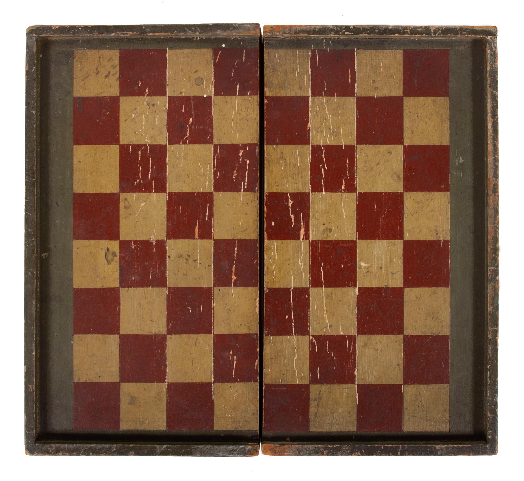 Red, black, and ochre white-painted, folding backgammon game board with leaf-like medallions, circa 1870-1890

American Backgammon and checker board, made of softwood, with a case that is hand-dovetailed at one end and nailed at the other
