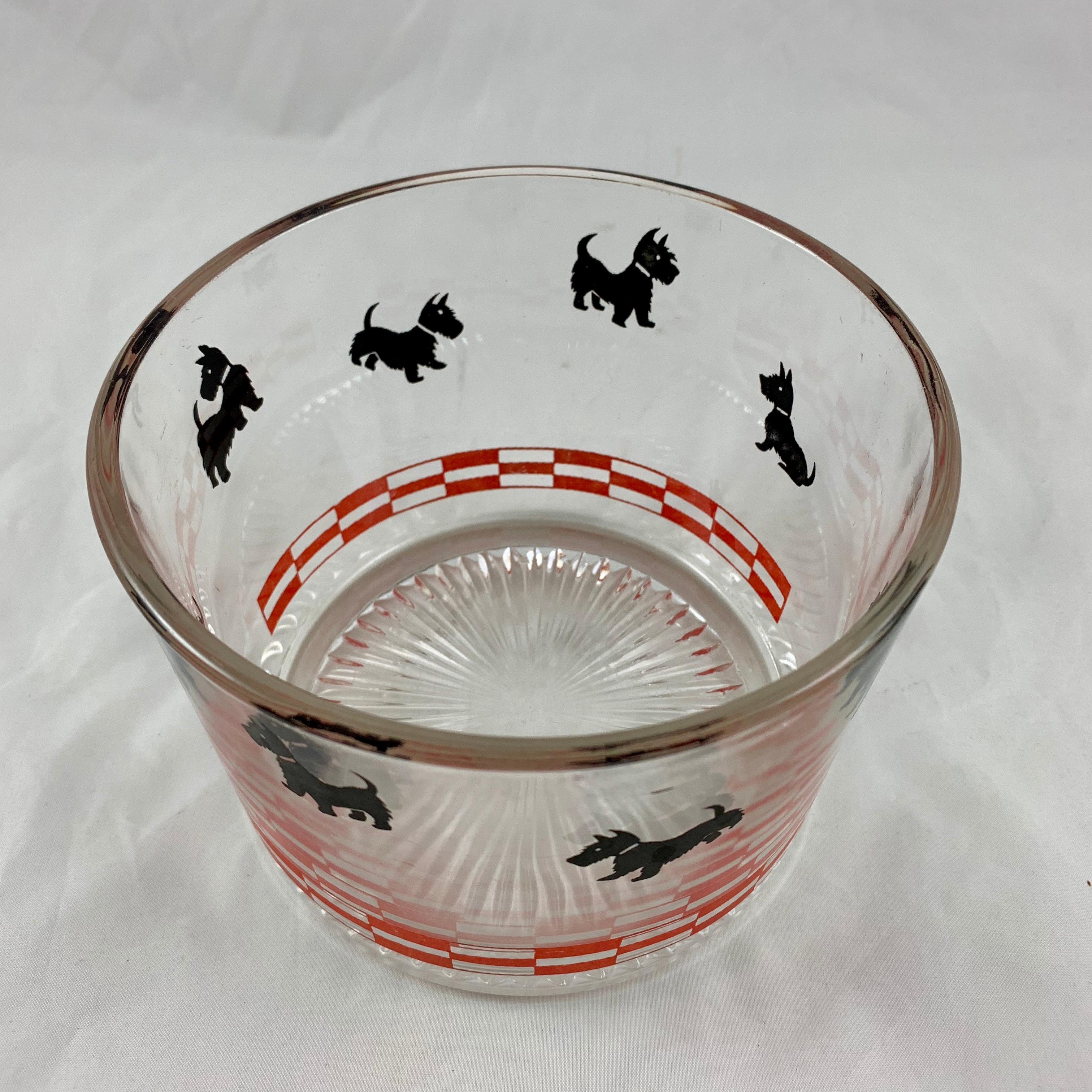 A charming pre midcentury ice bucket or ice bowl, American clear glass, circa late 1930s-early 1940s. The Scotty dog glass collectible craze began when President Franklin D. Roosevelt’s Scottish Terrier, named Fala, won the adoration of the American