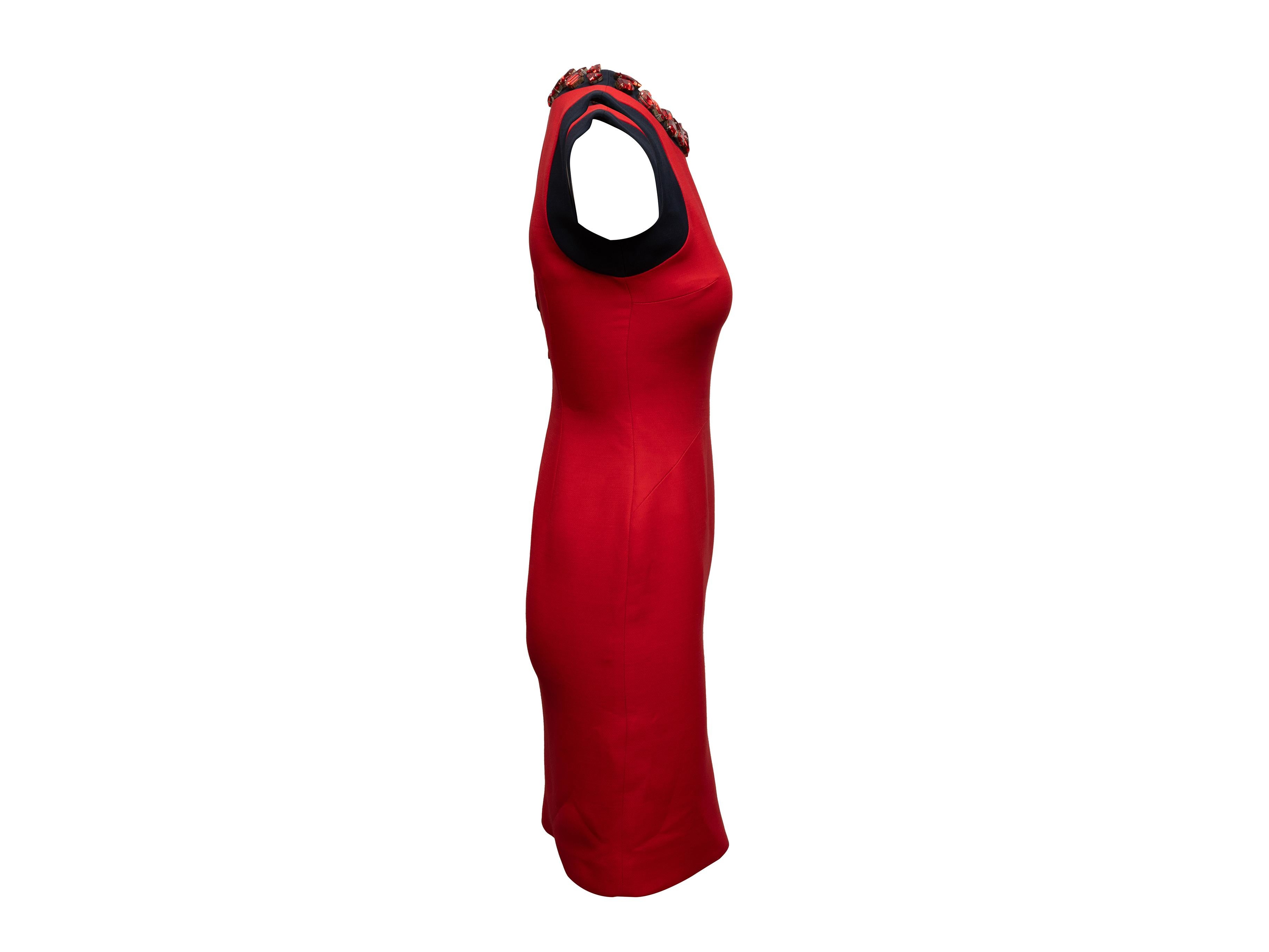 Red and black embellished wool and silk-blend bodycon dress by Prada. Crew neck featuring jewel embellishments. Zip closure at back. 31.5