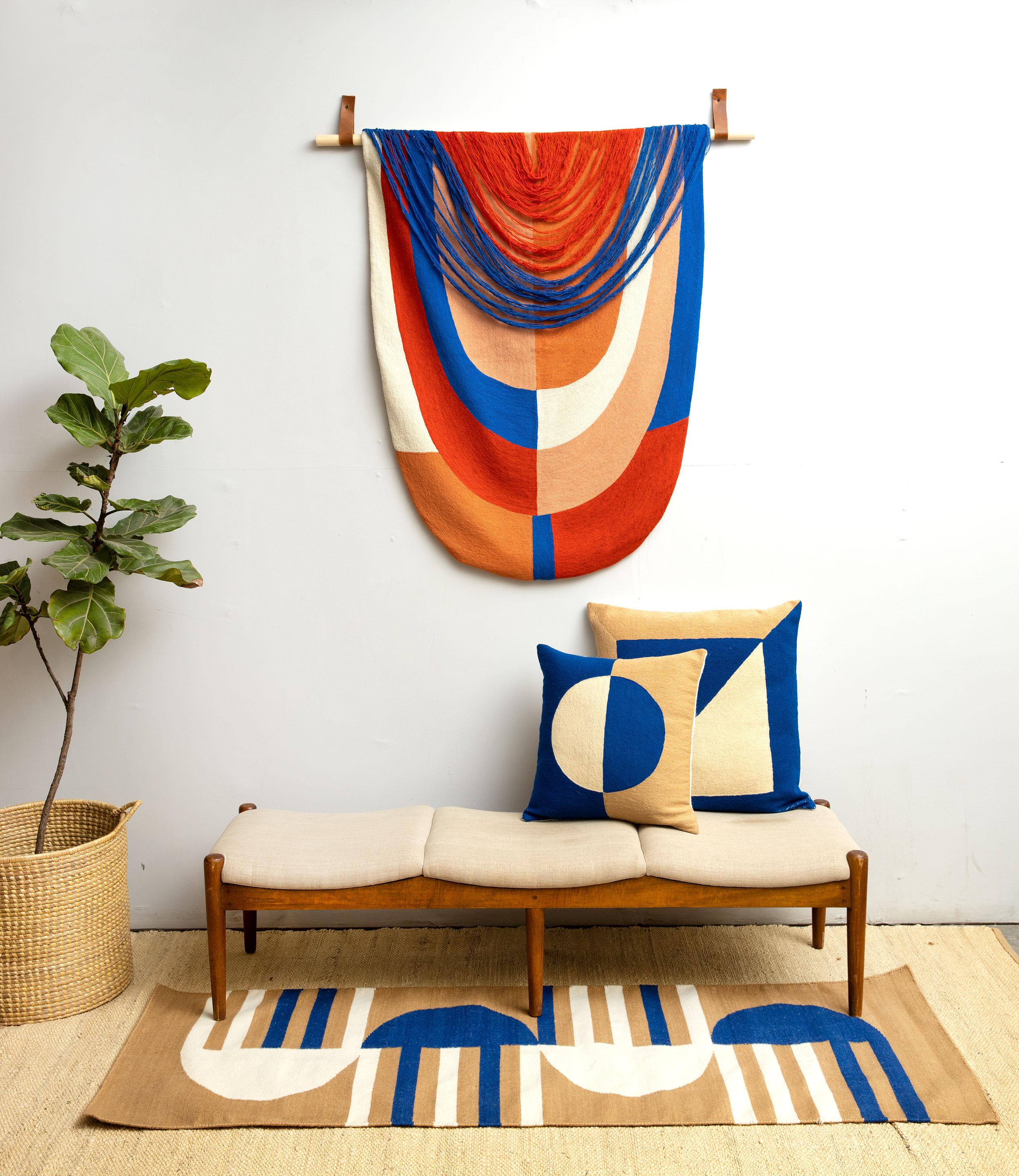 This modern, geometric tapestry has been ethically hand embroidered by artisans in Kashmir, India, using a traditional embroidery technique which is native to this region.

The purchase of this handcrafted tapestry helps to support the artisans