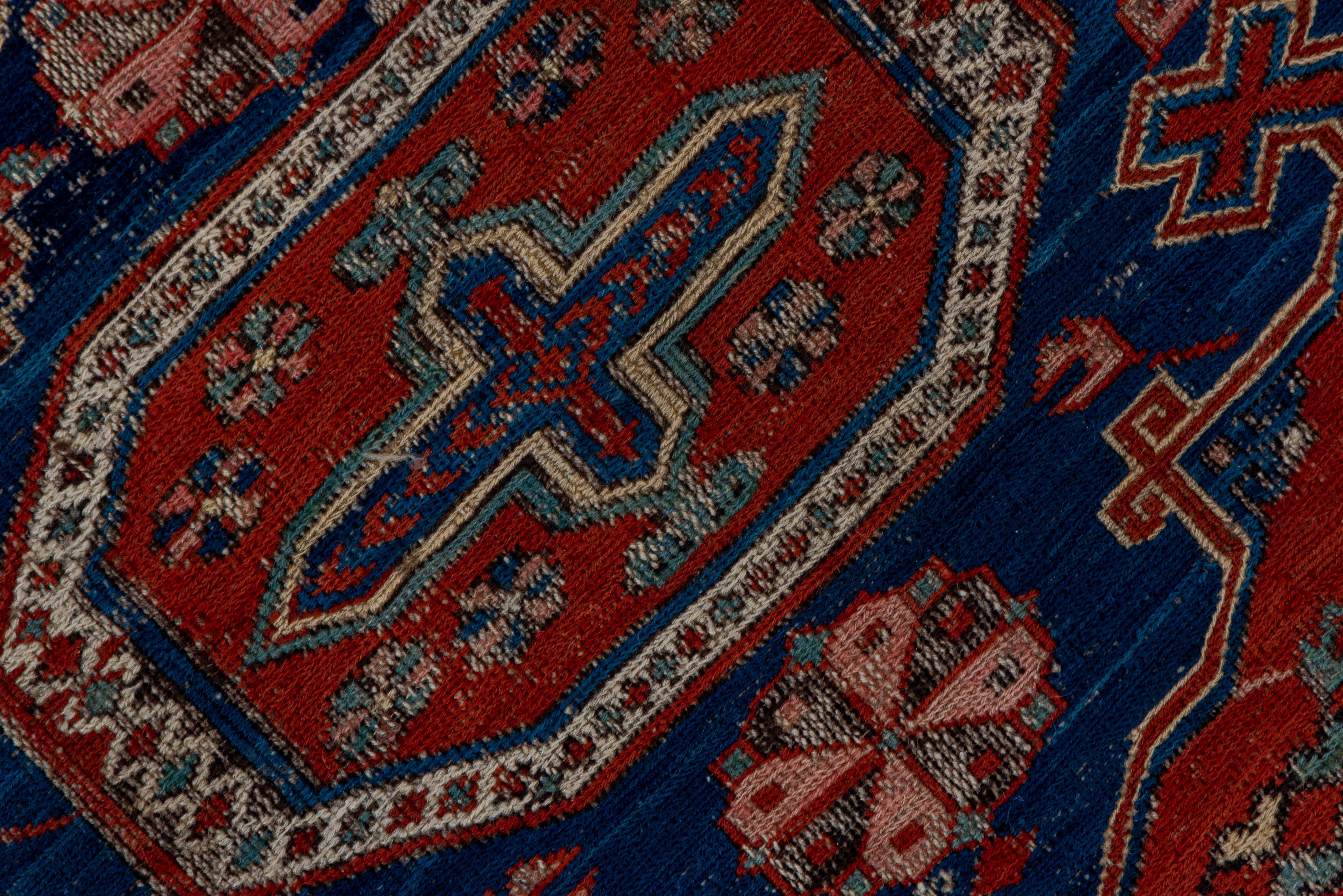 Early 20th Century Red Blue Royal Medallion with Florets Throughout - Sumak For Sale
