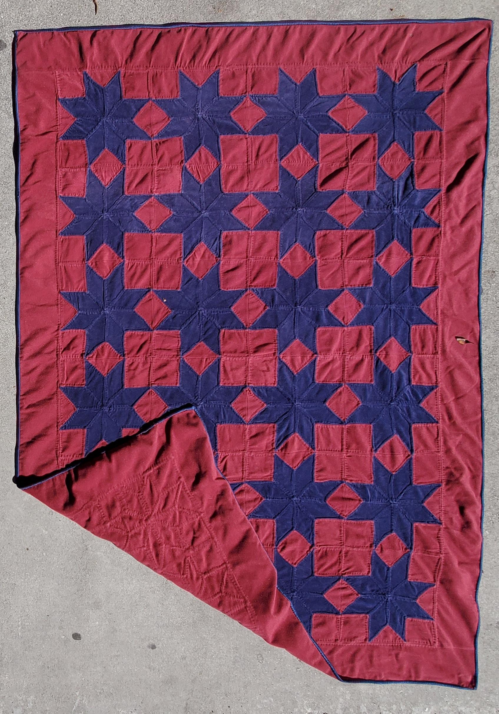 This fine red & blue velvet quilt with touching stars is in amazing unused condition.The quilting and piece work is very good.