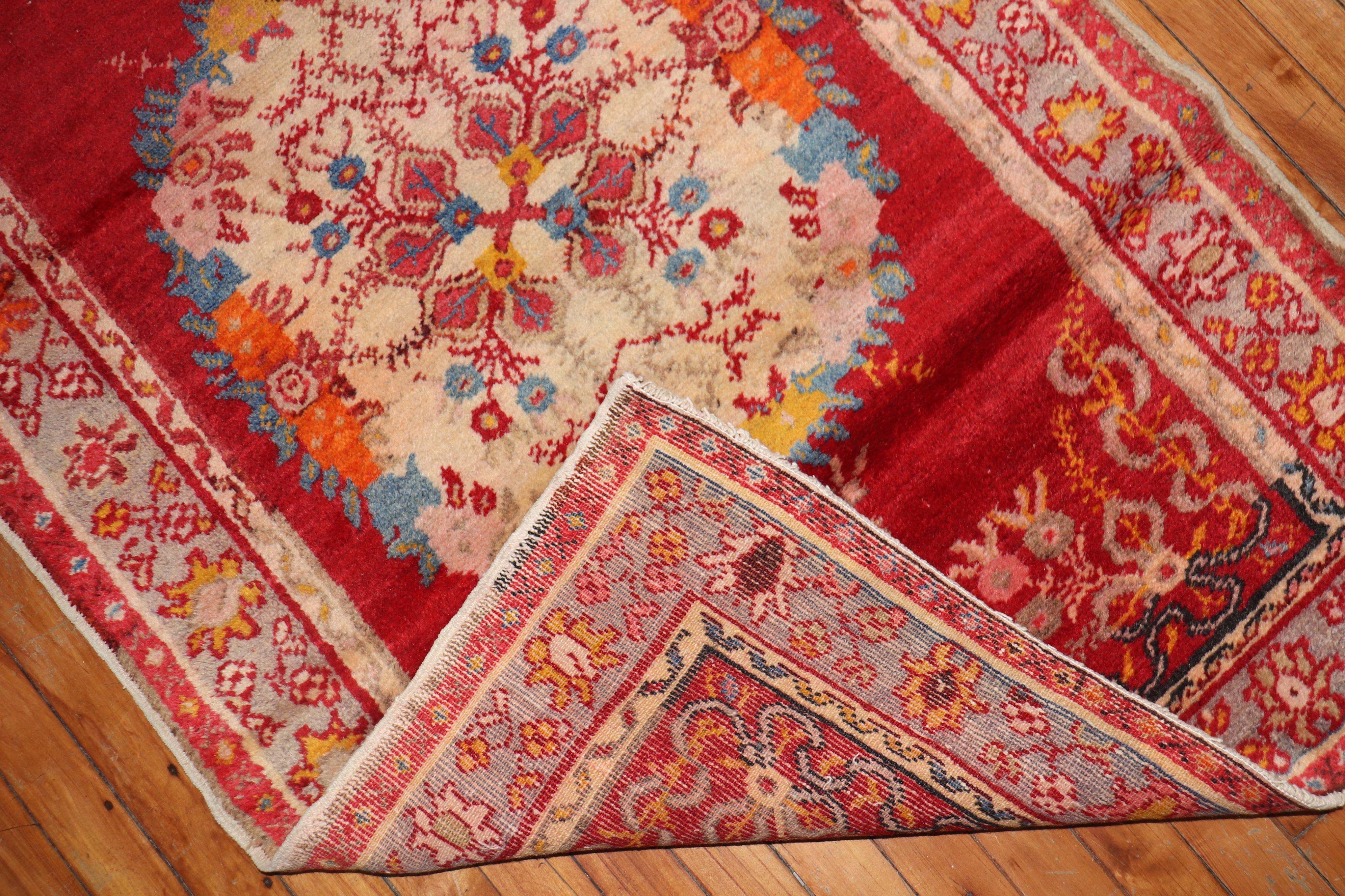 Vintage Turkish Oushak runner with three medallions on a bright red field.

Measures: 3' x 10'9''.
