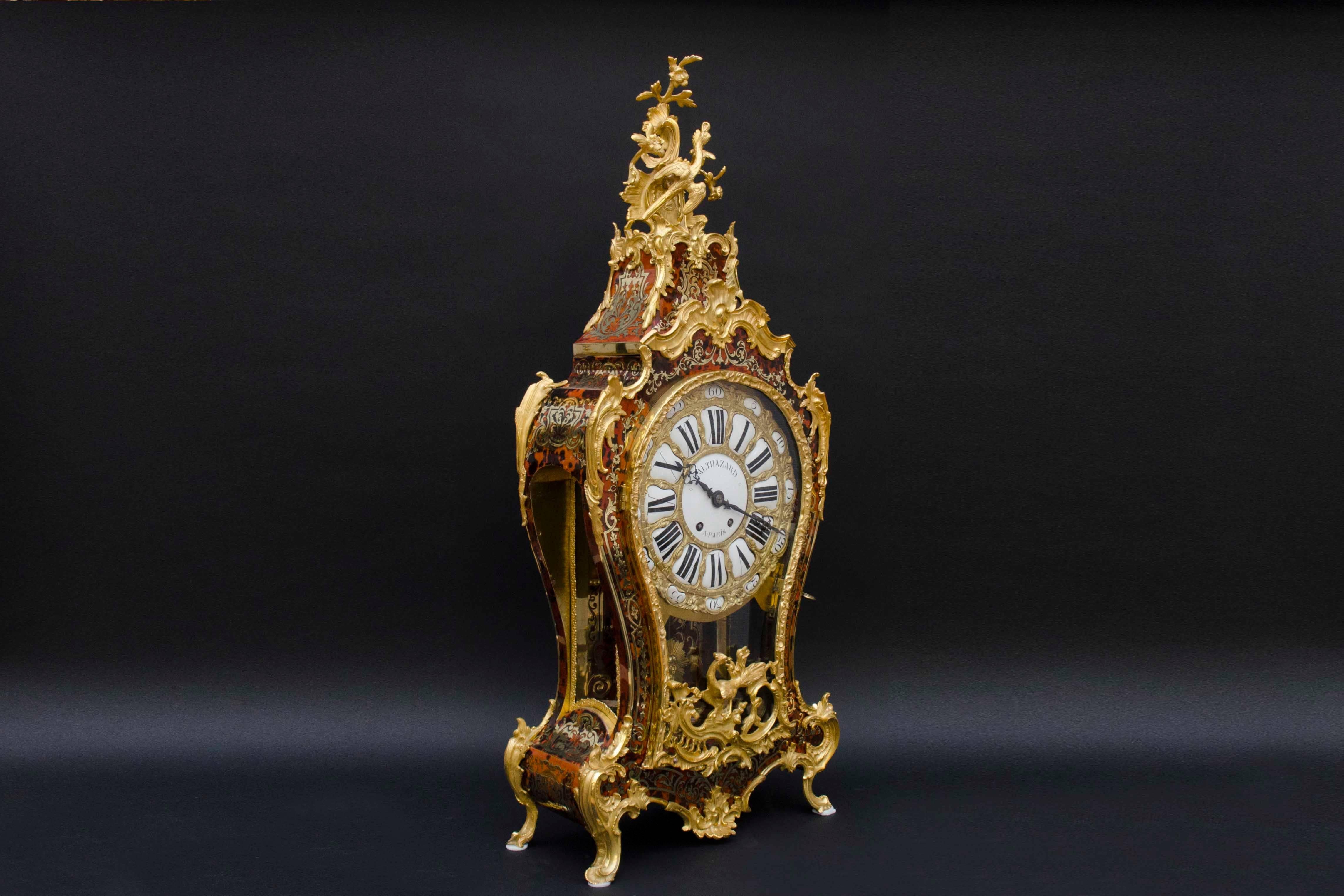 Large Boulle marquetry and gilt bronze carte clock signed on the dial 