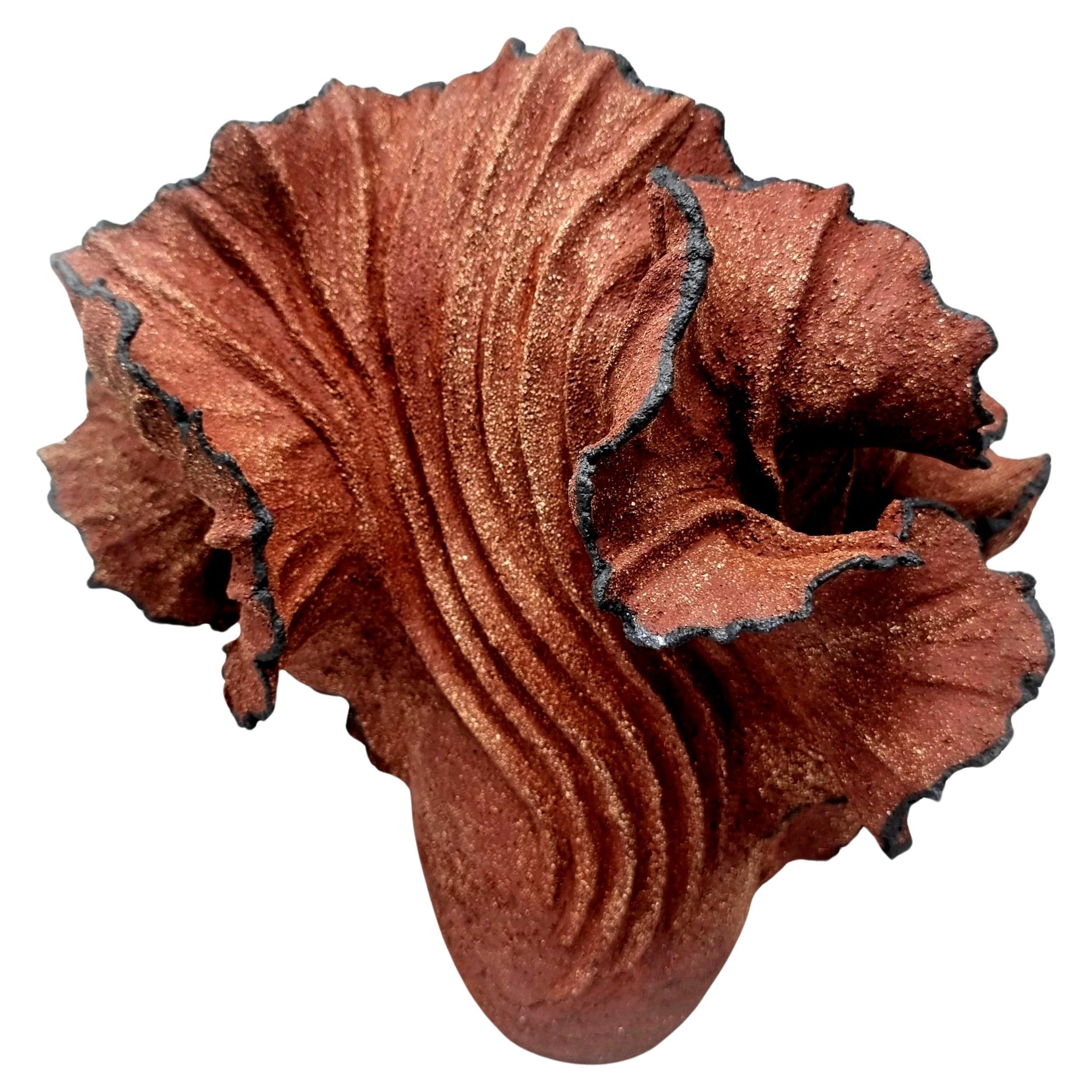 Handbuilt Stonewear Sculpture in red/braun stonewear clay

It is sculpted by hand, slowly adding coils and clay to create the final result. This is a piece of art based on classic sculpting methods. 
 
The color of the sculpture hcanges depending on