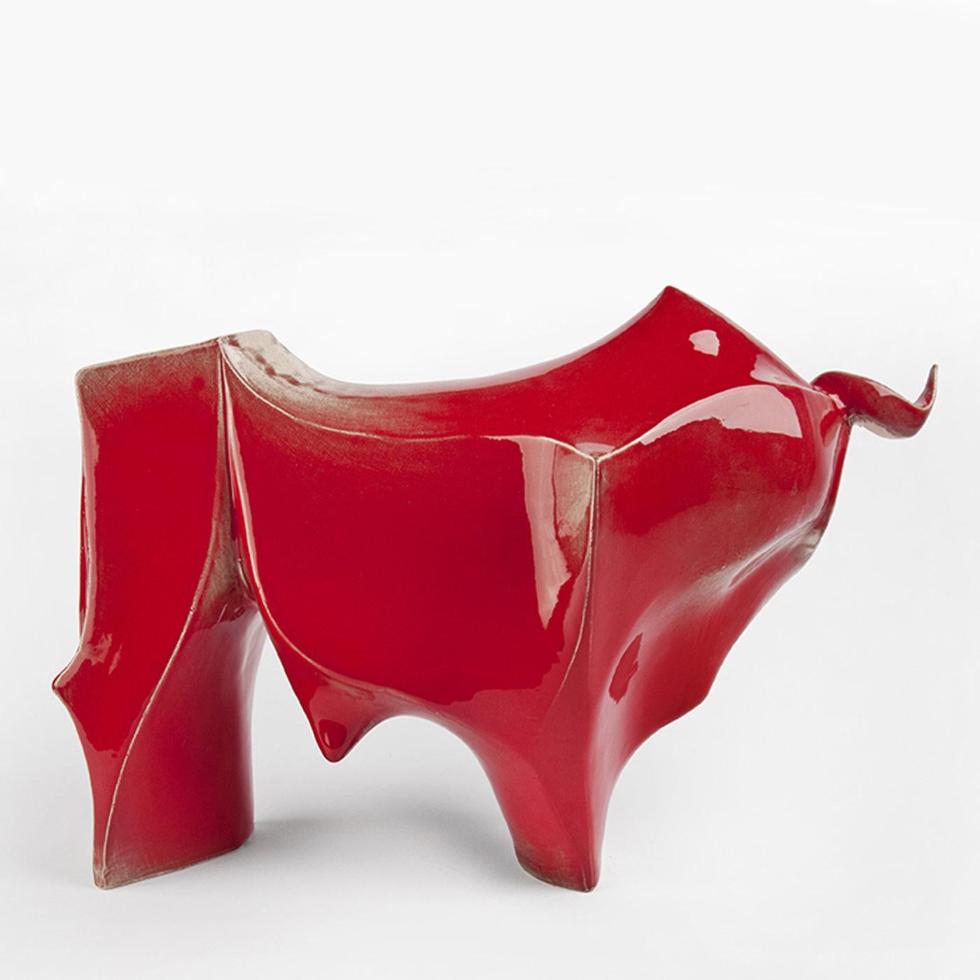 Inspired by Van Gogh's unique painting style and Picasso's renowned bulls, this sculpture boasts a contemporary aesthetic of refined architectural value. Masterfully handcrafted of ceramic and painted in a polished red lacquer, the bull boasts a