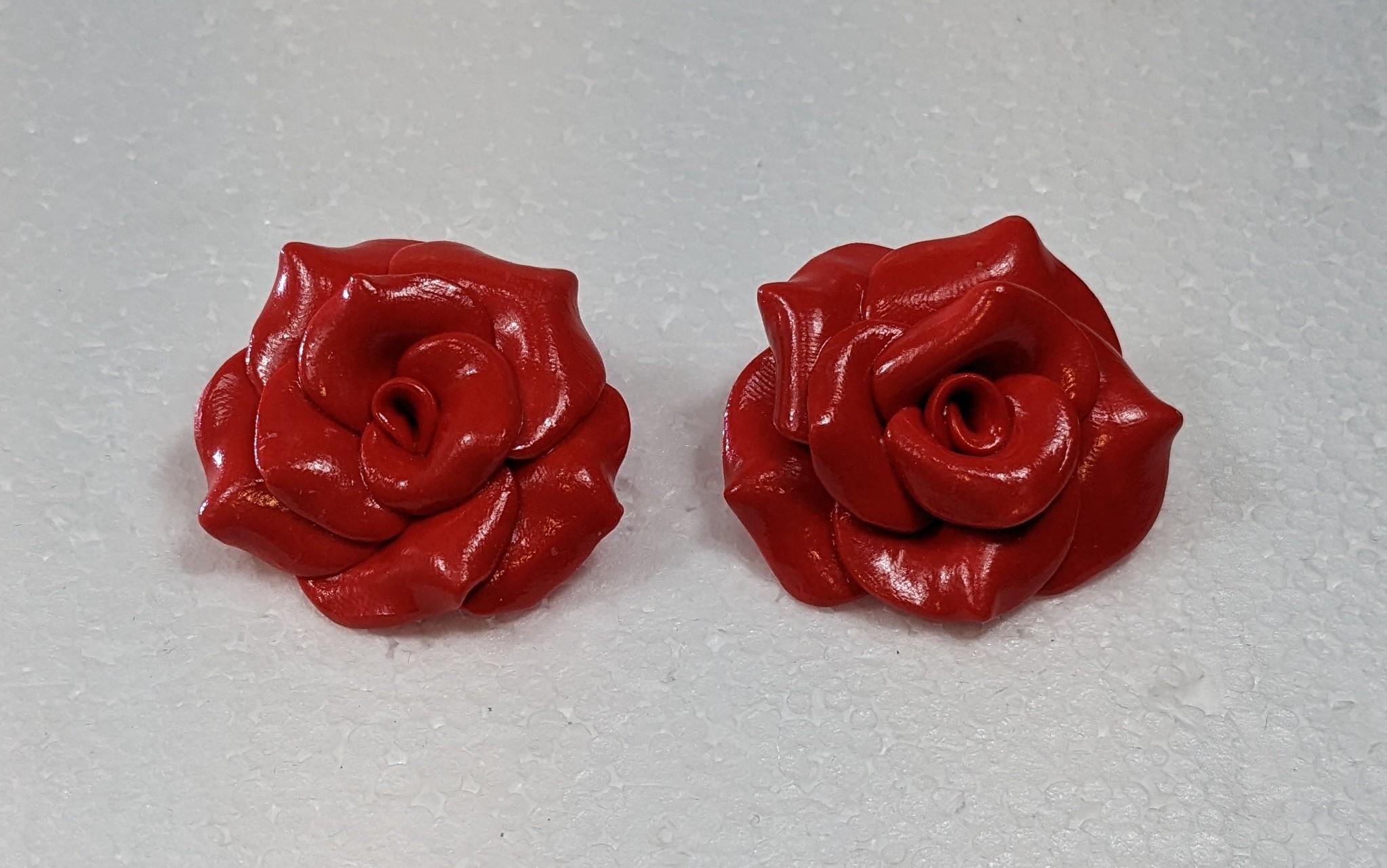  Red Camelia Polymer  Clay Earrings with golplated silver closure

Diameter: 4 cm
Weight: 16 grams
Color  Red
Handmade




Pradera Fashion Division  is specialized in European Fashion designers, clothing, handbags, accessories and as such we sell
