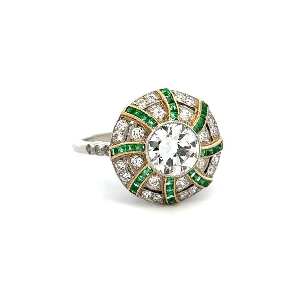 Simply Beautiful Show Stopper! Finely detailed Old European Cut Diamond and Emerald Show Stopper Platinum Swirl Statement Cocktail Ring. Centering a securely nestled Hand set 1.28 Carat OEC Diamond. Surrounded by Diamonds, weighing approx. 0.64tcw