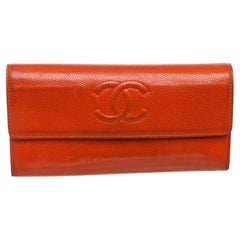 Red caviar leather Chanel CC long flap wallet with tonal leather lining, twelve