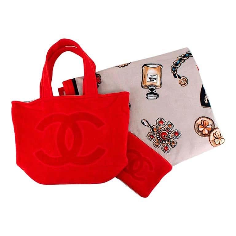 Chanel Red CC Terry Cotton Beach Bag & Towel Set 

 - Playful cotton terry toweling beach set rendered in vibrant cherry red, featuring a whimsical accessories print 
- Set comprises a beach tote, zip pouch and beach towel 
- Soft unstructured, open