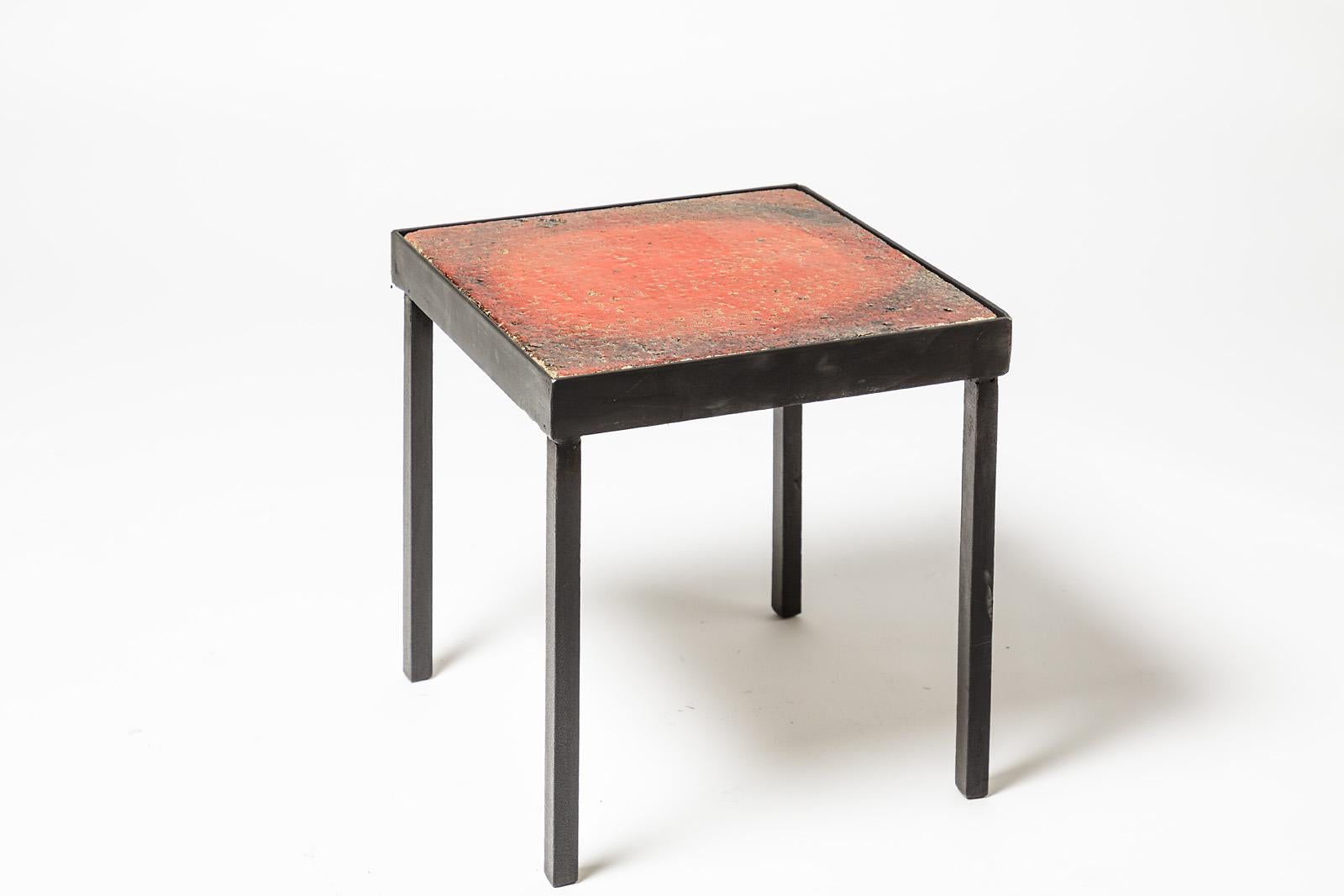 French ceramic low table,

circa 1950.

Elegant red ceramic glaze.

Dimensions: 34 x 34 x 34 cm.