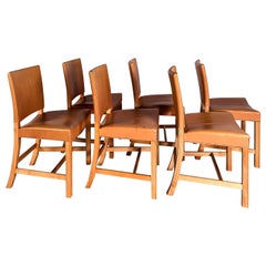 Red Chairs, a Set of Six by Kaare Klint