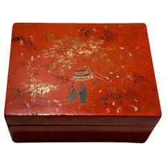 Caja de laca roja con escena de jardín chino