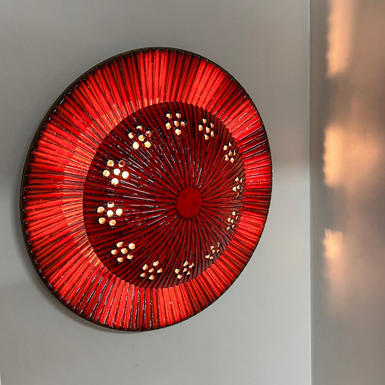 Spectacular red circular ceramic wall lights , with beautiful black accents. Manufactured in Denmark in the 1970s.

A unique statement piece.

Labelled and signed by Axella, in excellent condition. Axella was found in the 70s in Denmark by Aksel