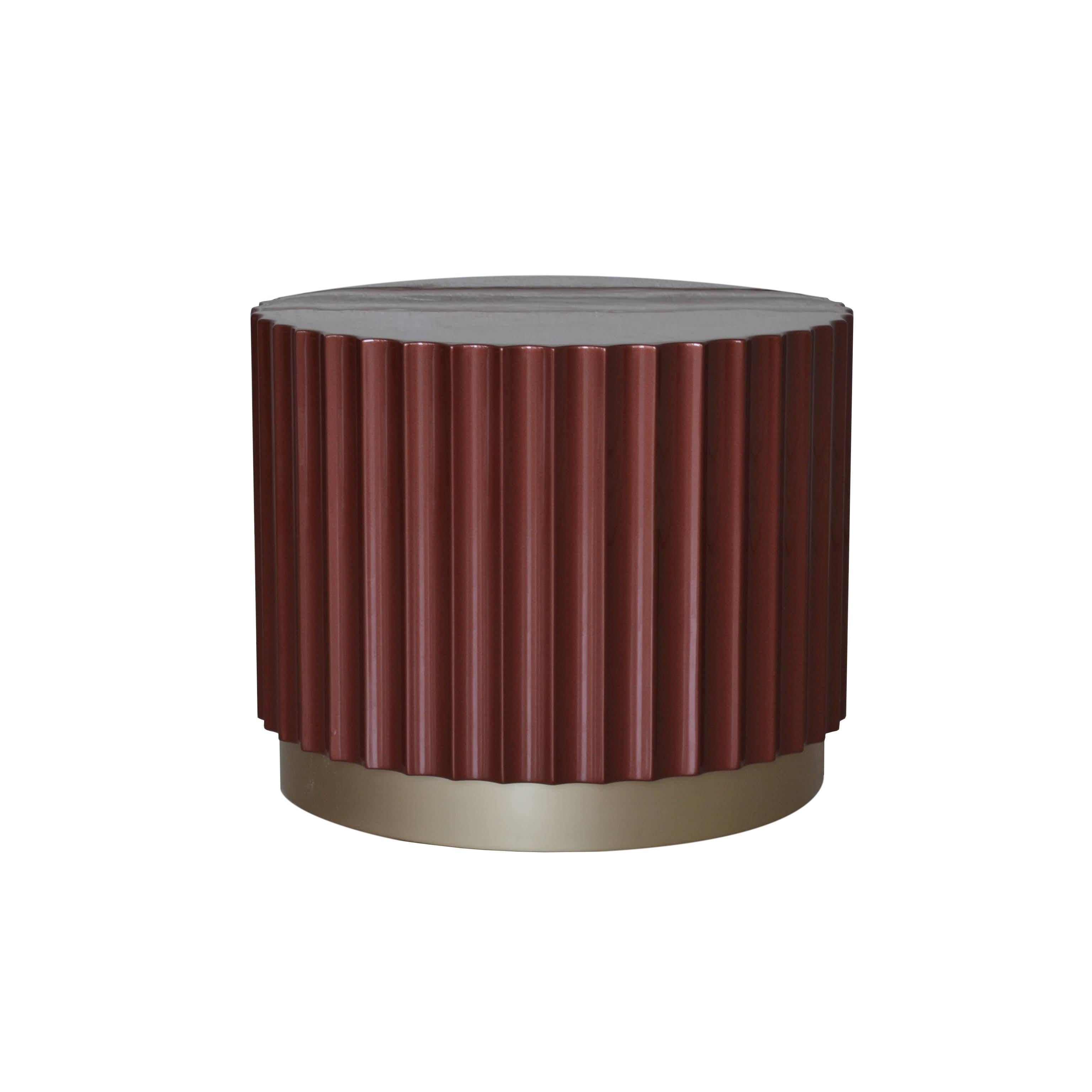 This column pedestal feature red / burgundy / terracota with brass painted base. Beautiful glossy lacquer finish, inspired from greek ancient architecture; can also be used as a bedside table.