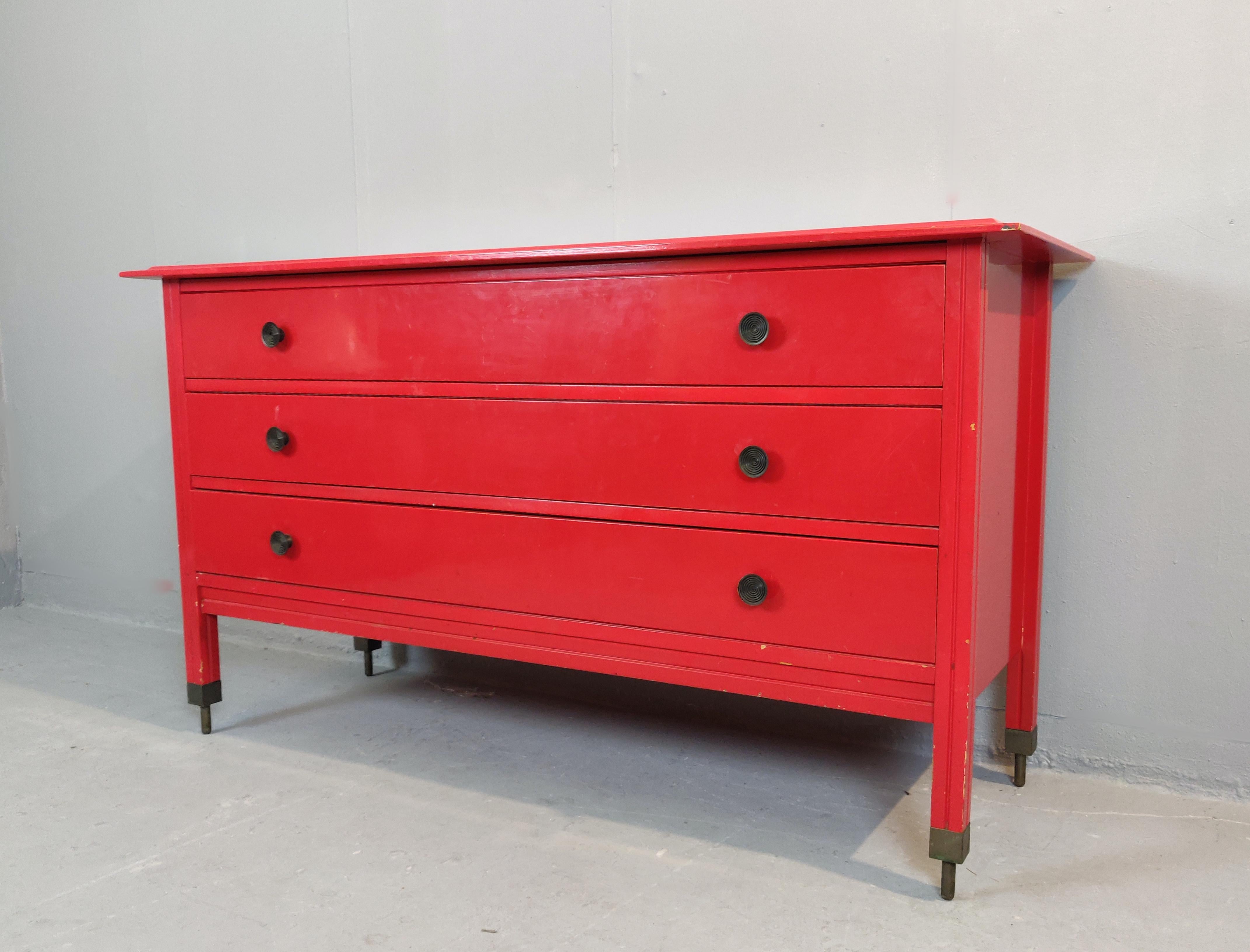 Red chest of drawers by Carlo di Carli, Italy, circa 1960.