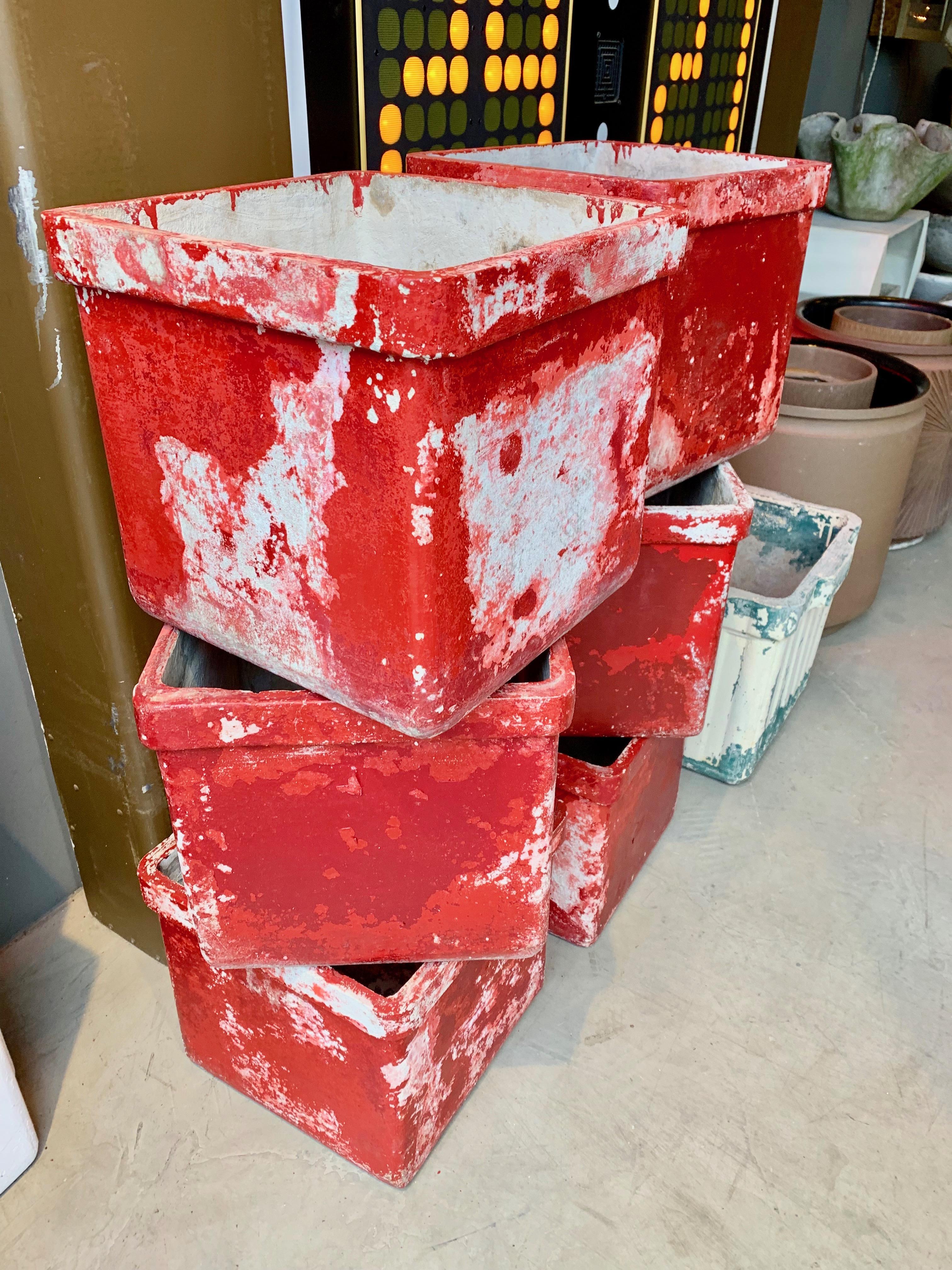 Set of 6 concrete box planters by Willy Guhl. Made in the 1960s in Switzerland. Red paint with excellent patina. 6 available. Priced individually.





   