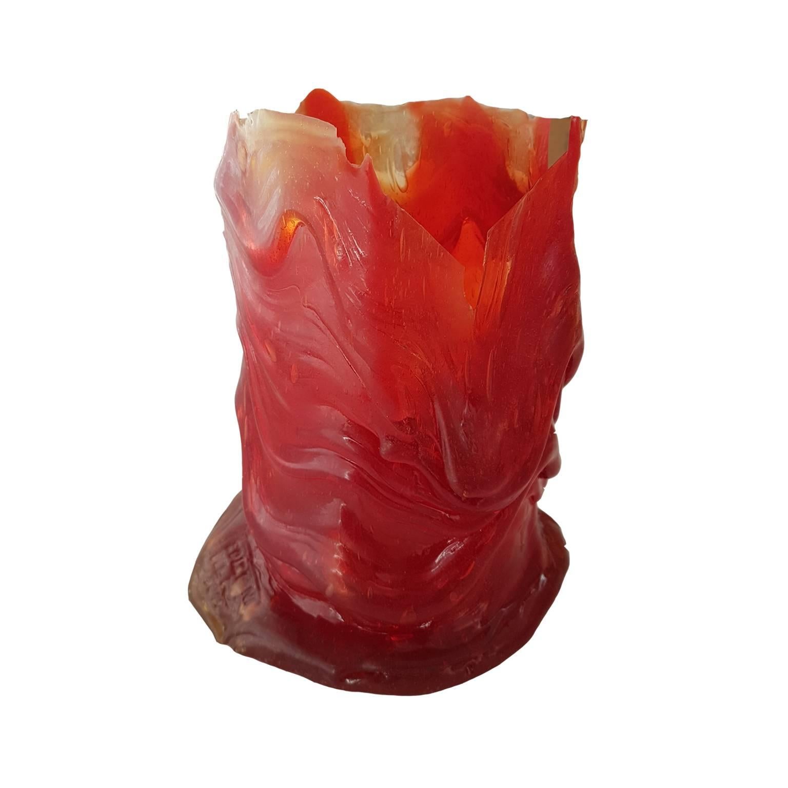 This red basket made in resin is part of 