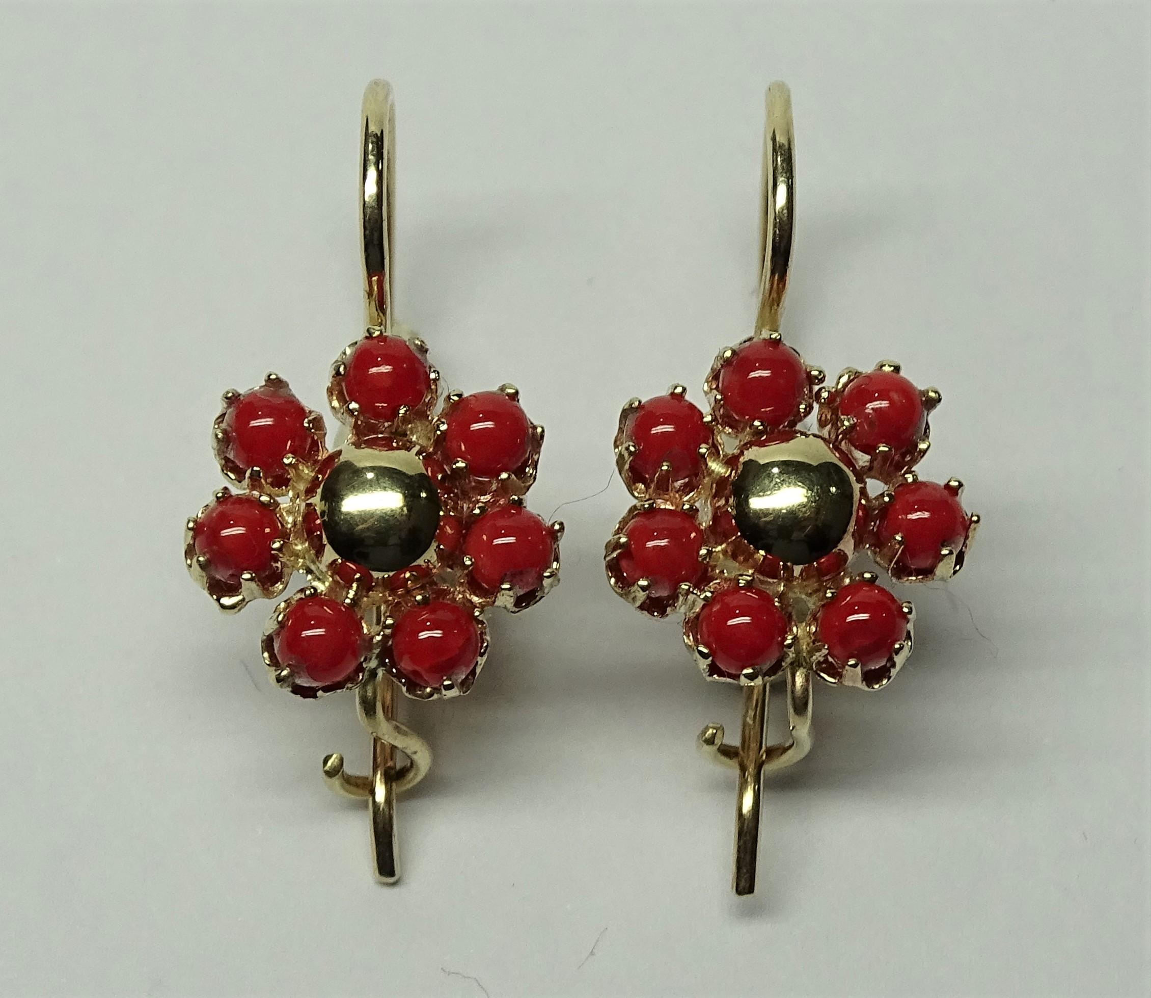 These Earrings are made of 14K Yellow Gold.
These Earrings have 0.65 Carats of Round Cut White Diamonds.
These Earrings have 14 Red Coral Dots.
All our Earrings have pins for pierced ears but we can change the closure and make any of our Earrings