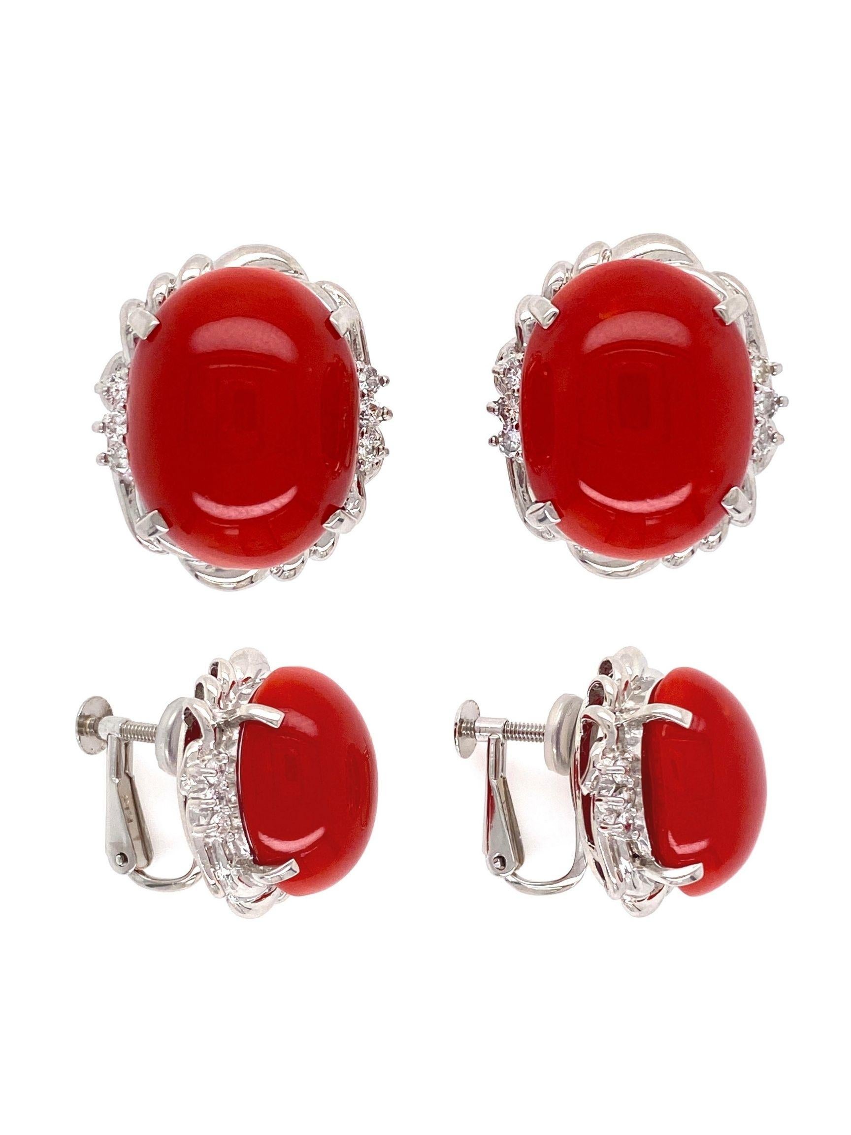 Simply Beautiful and finely detailed Retro style Red Coral and Diamond Earrings set with awesome cabochon Red Corals weighing approx. 18tcw and enhanced with 12 round brilliant-cut Diamonds weighing approx. 0.22tcw. Earrings Measure approx. 0.62