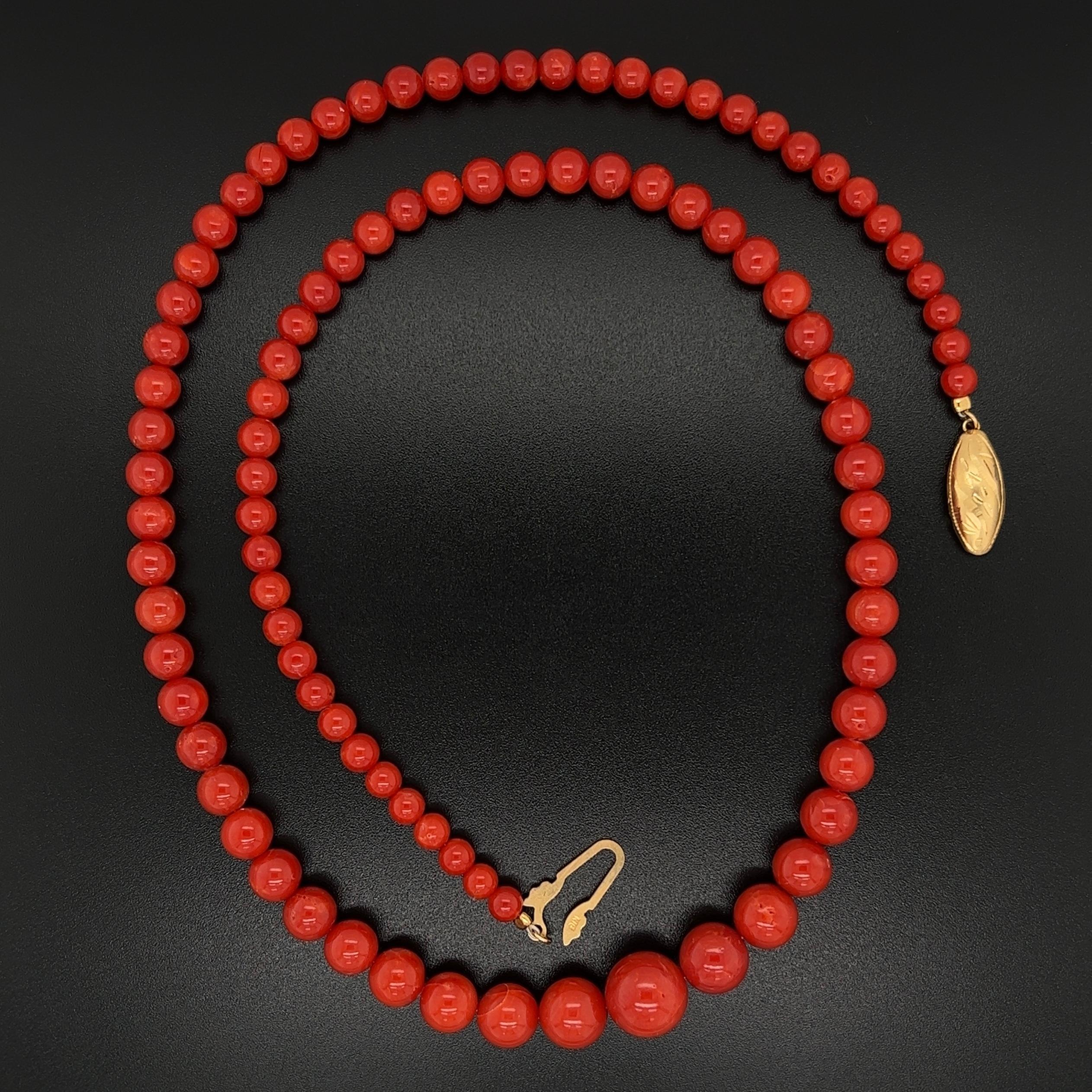 Simply Beautiful! Red Coral Necklace, comprising 95 Coral beads, each approx. 3.9mm-9.3mm, held by a 18K Yellow Gold clasp. Hand strung with matching silk cord. The necklace measures approx. 19” long. More Beautiful in real time! Classic and