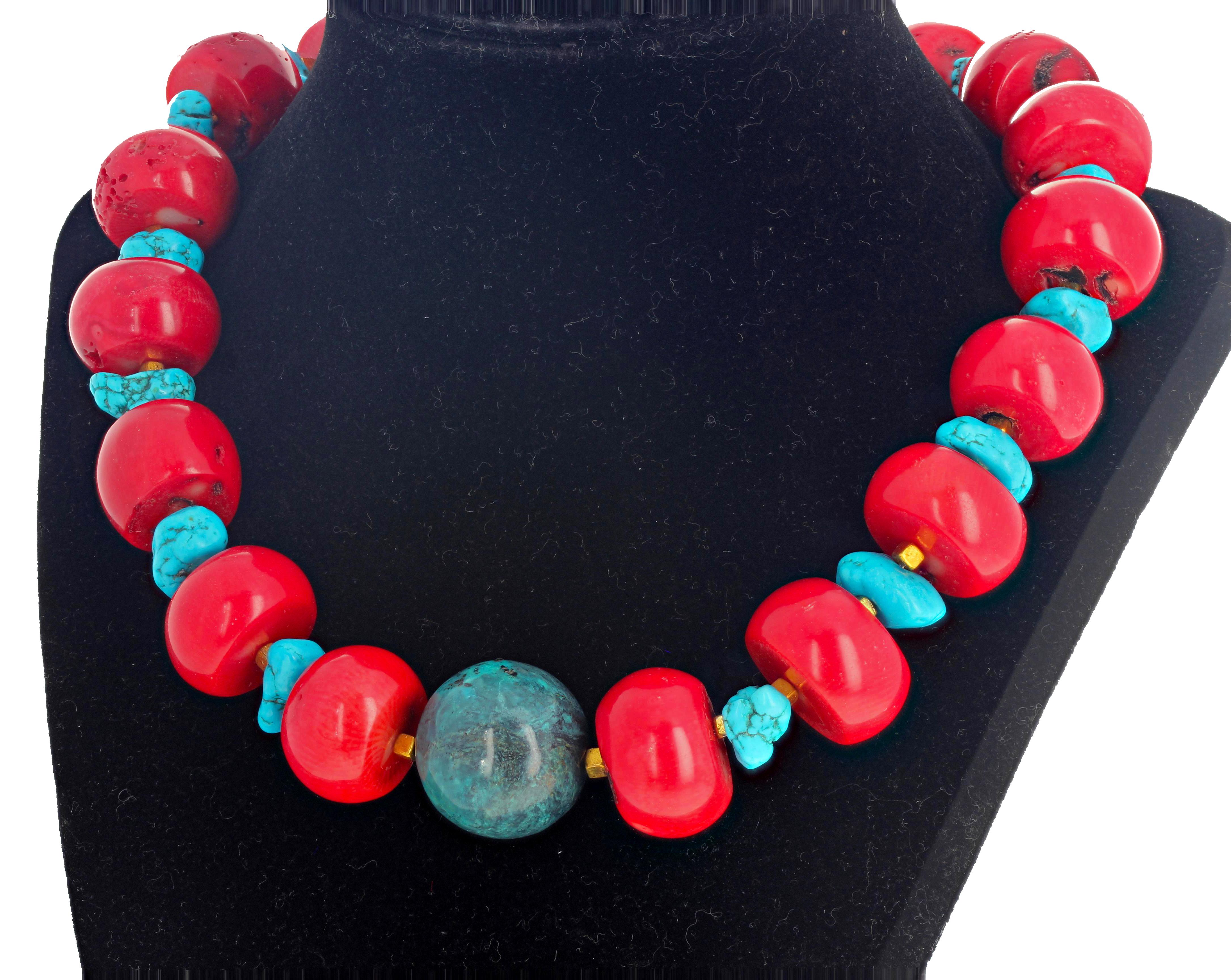 Central gorgeous highly polished natural blue Azurite (23.4 mm) enhanced by beautiful natural red Bamboo Coral and polished chunks of blue Magnesite in this unique 18 inch long necklace with goldy hook clasp.  The Bamboo Corals are approximately 21