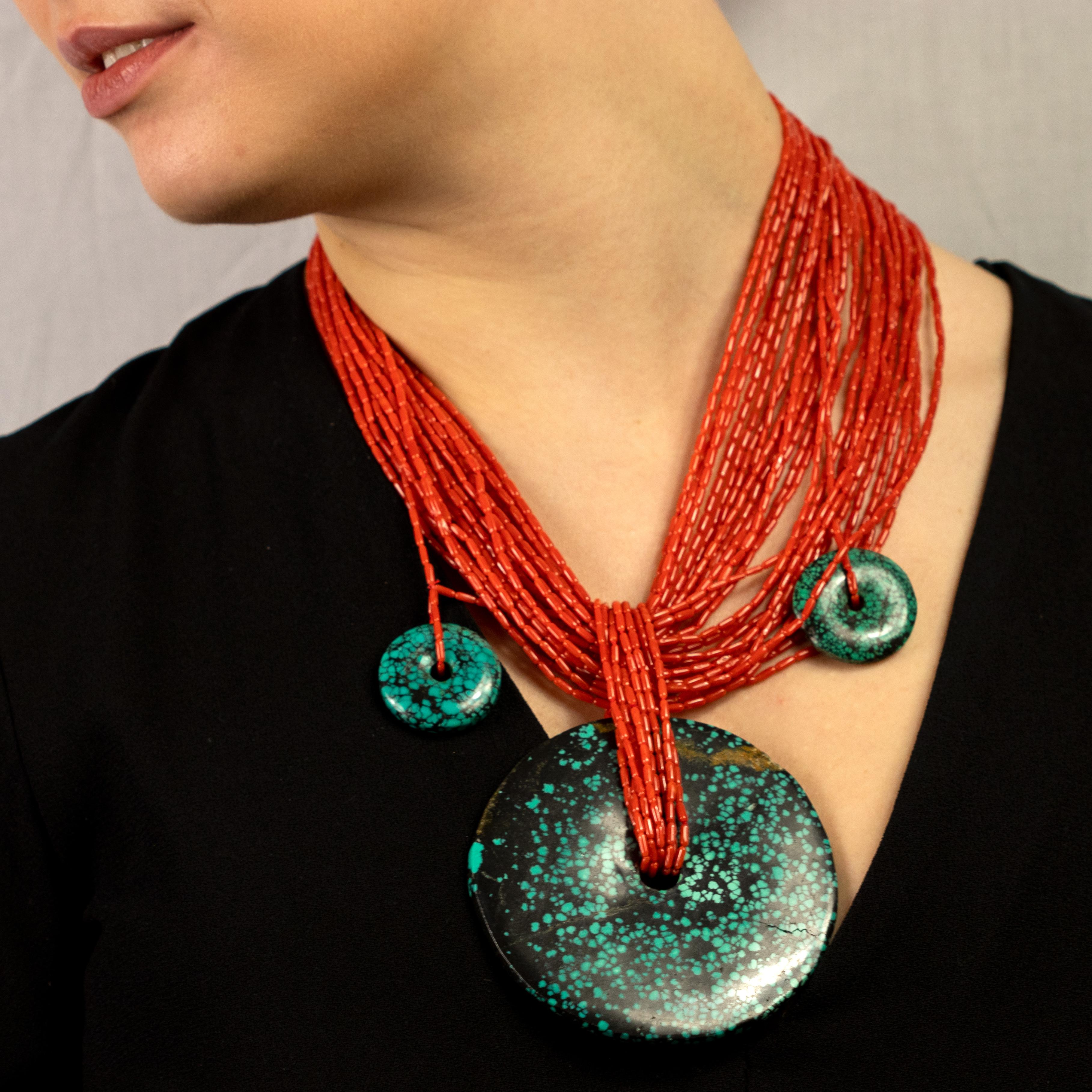 Unrepeatable necklace with red coral beads embellished by three pendant stones of natural jade. The red coral can be found in the Mediterranean sea and is the most valuable of all precious corals. 

This design is inspired by the milky way. Green