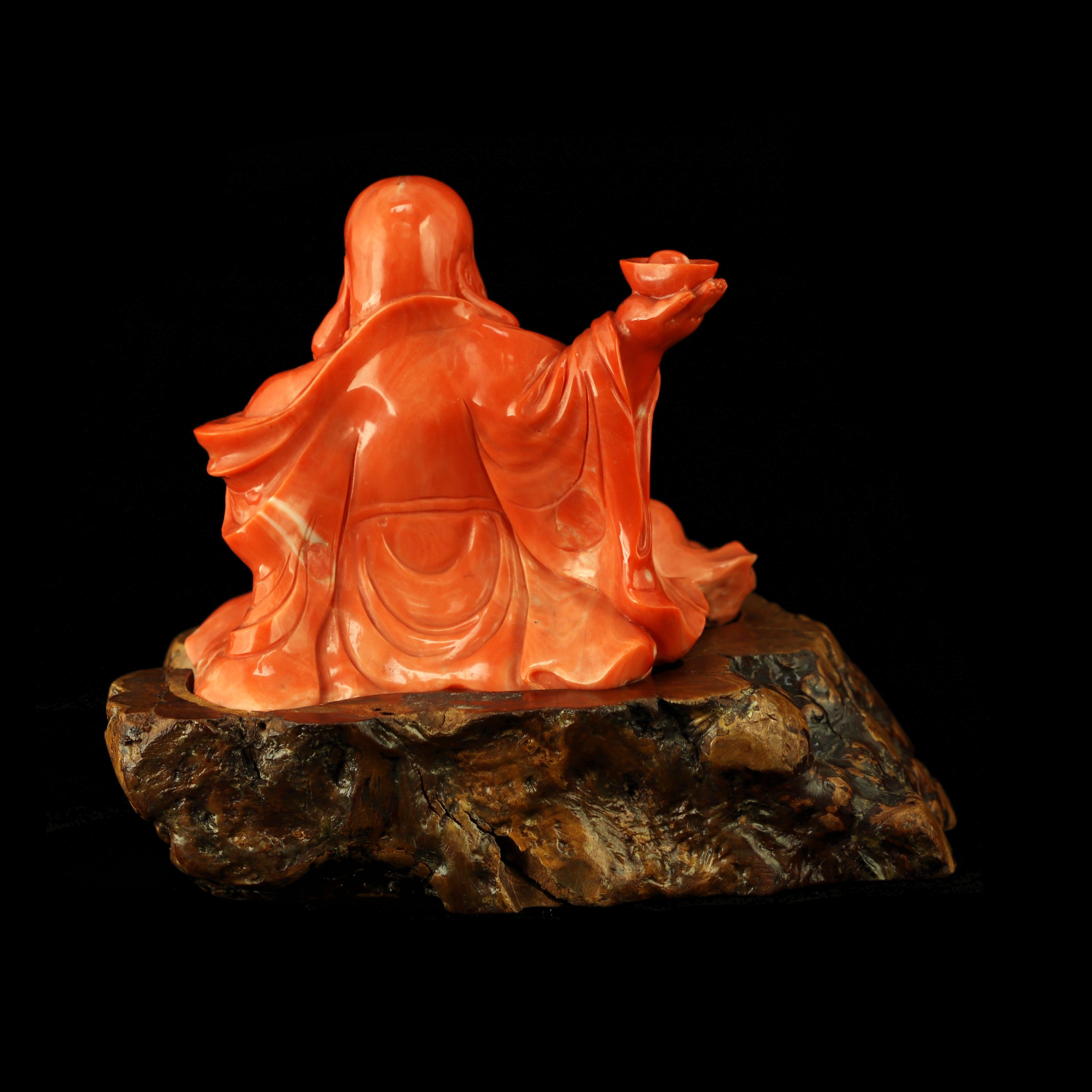 red laughing buddha statue