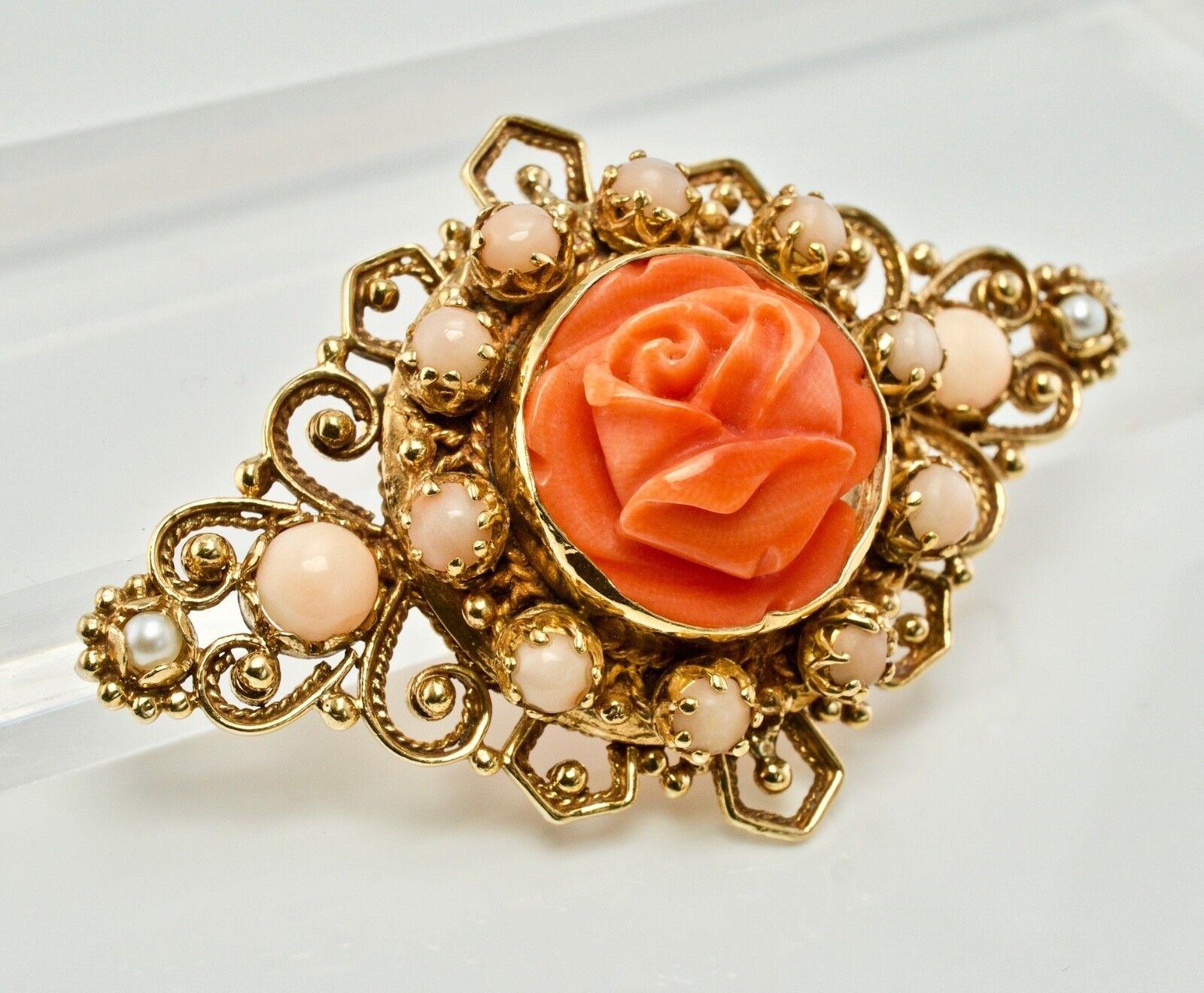 Red Coral Pearl Rose Flower Pendant Brooch 14K Yellow Gold

This gorgeous vintage piece is finely crafted in solid 14K Yellow gold (stamped and also carefully tested and guaranteed). The center beautiful carved coral flower measures 16mm. It is