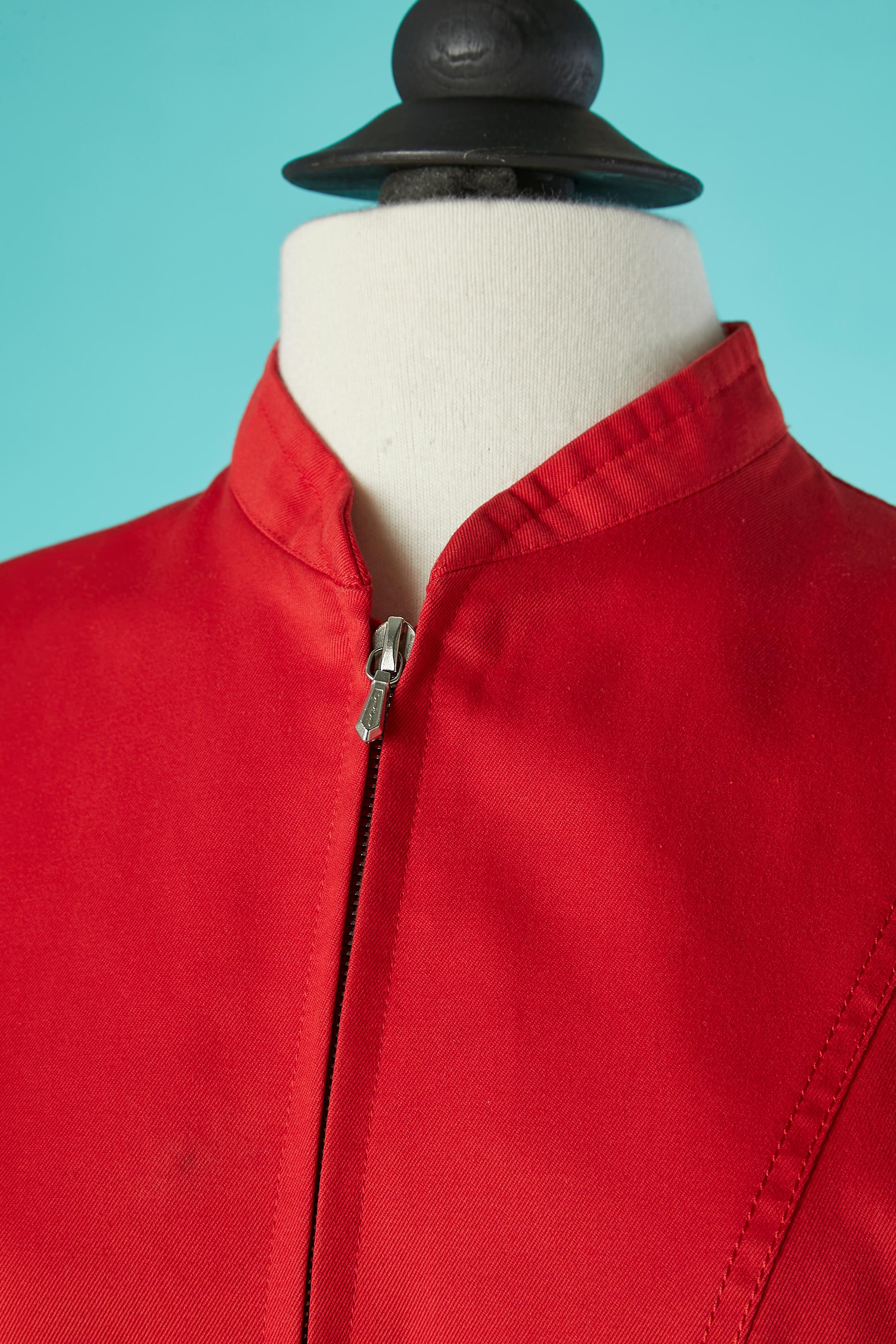 Red cotton jacket with zip closure middle front. No lining. Pockets on both side and cut-work on the waist. 
SIZE M 