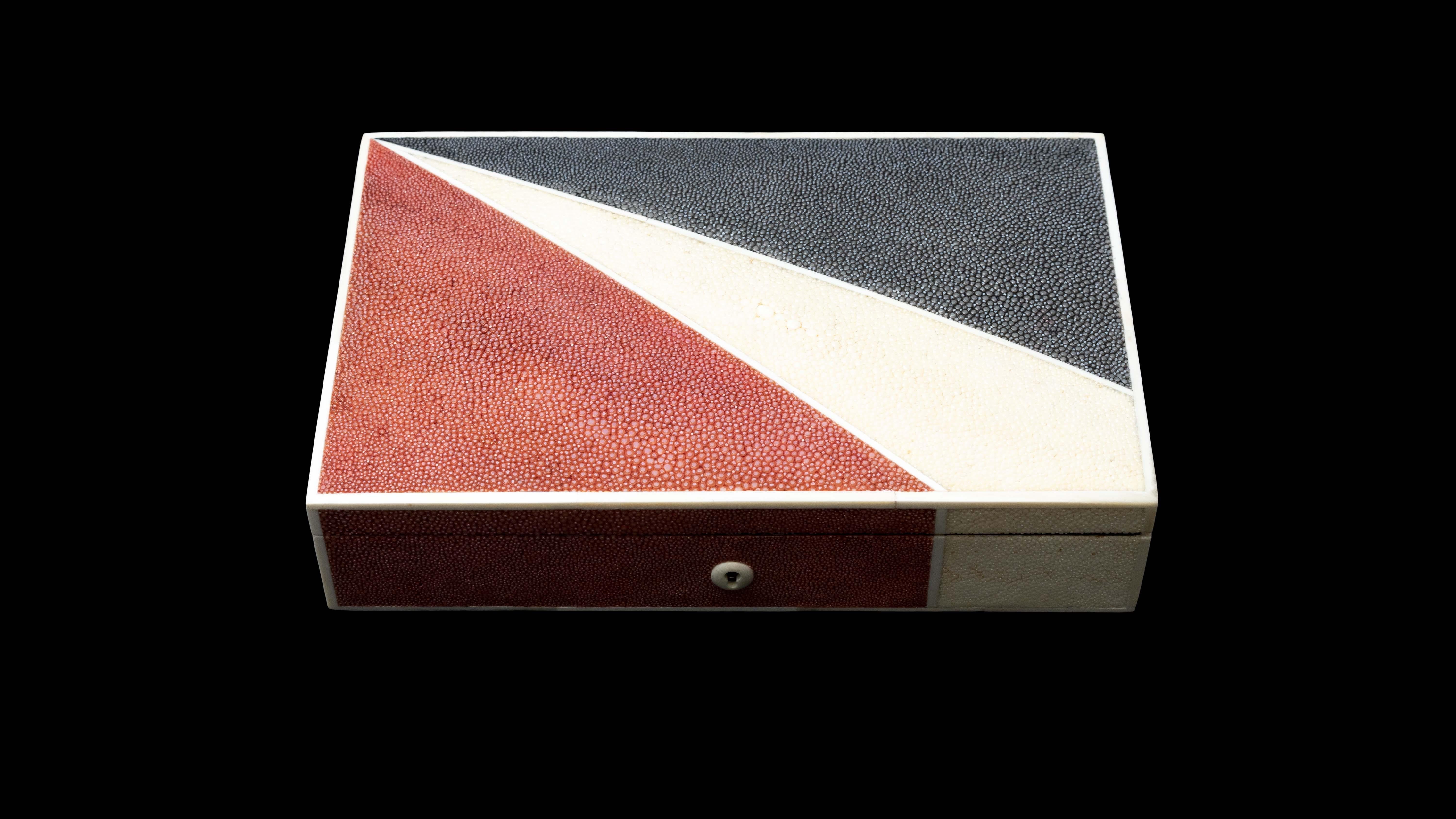 Red cream & black Shagreen box

Measures approximately: 10