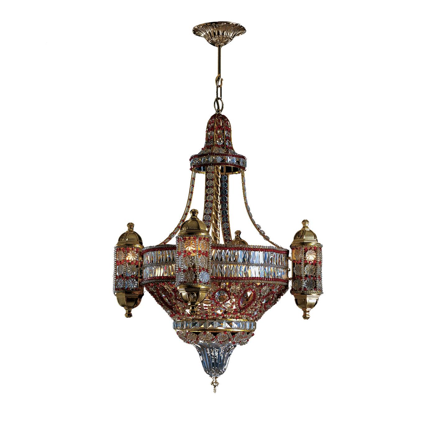 A spectacular piece that will make a statement in any decor, this chandelier combines exotic allure with traditional craftsmanship, for a final effect that is luxurious and sophisticated. Its complex structure, featuring a top element with a