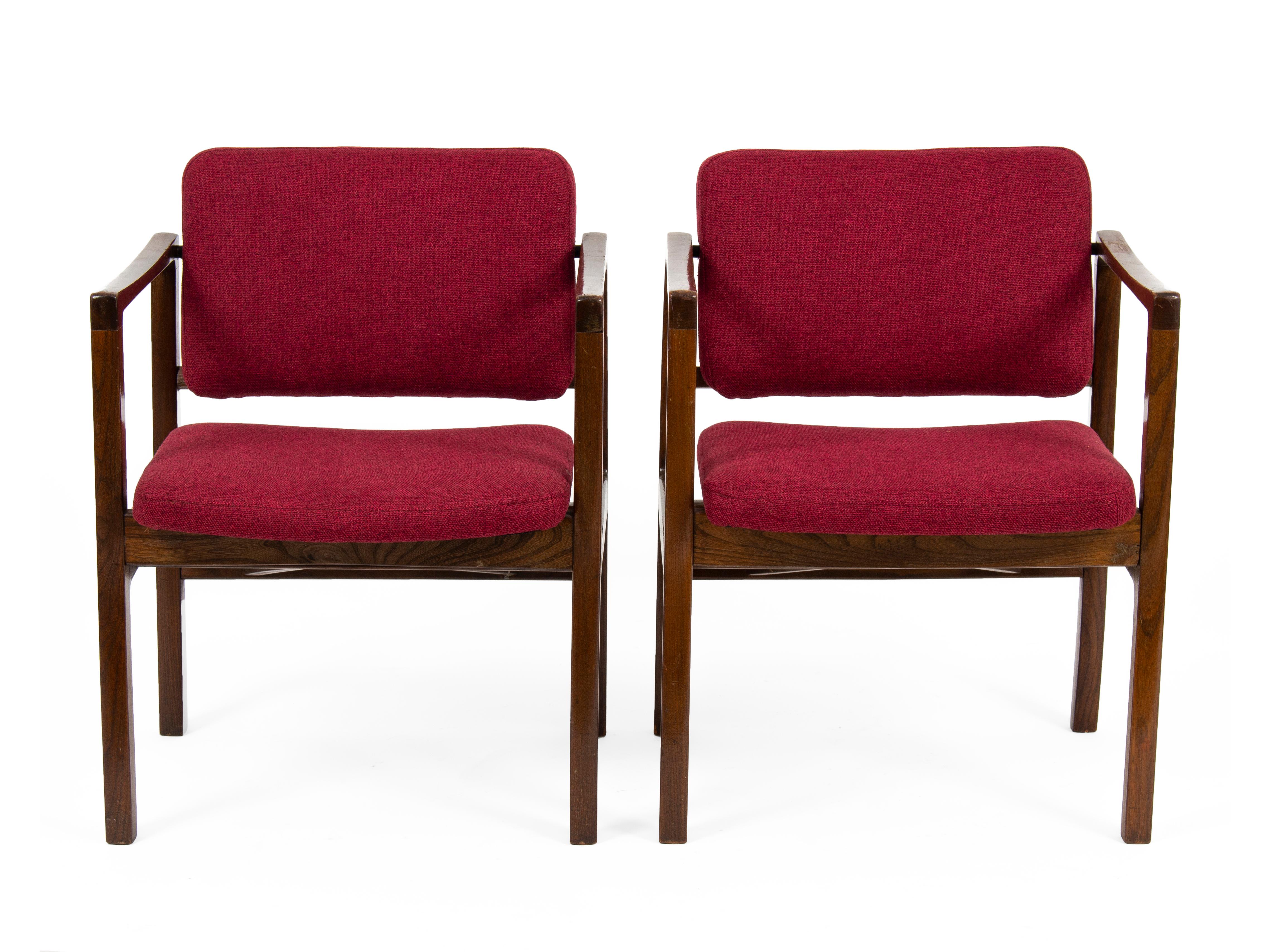The set of 8 chairs was designed and manufactured in the 1970s in Czechoslovakia. The armchairs are newly reupholsetered.