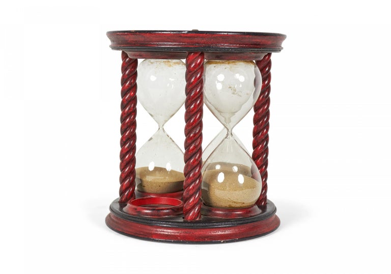 Reloj de arena lacado decorado en rojo en venta en 1stDibs España