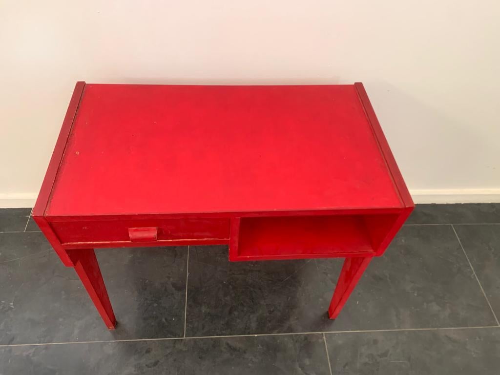 red desk with drawers