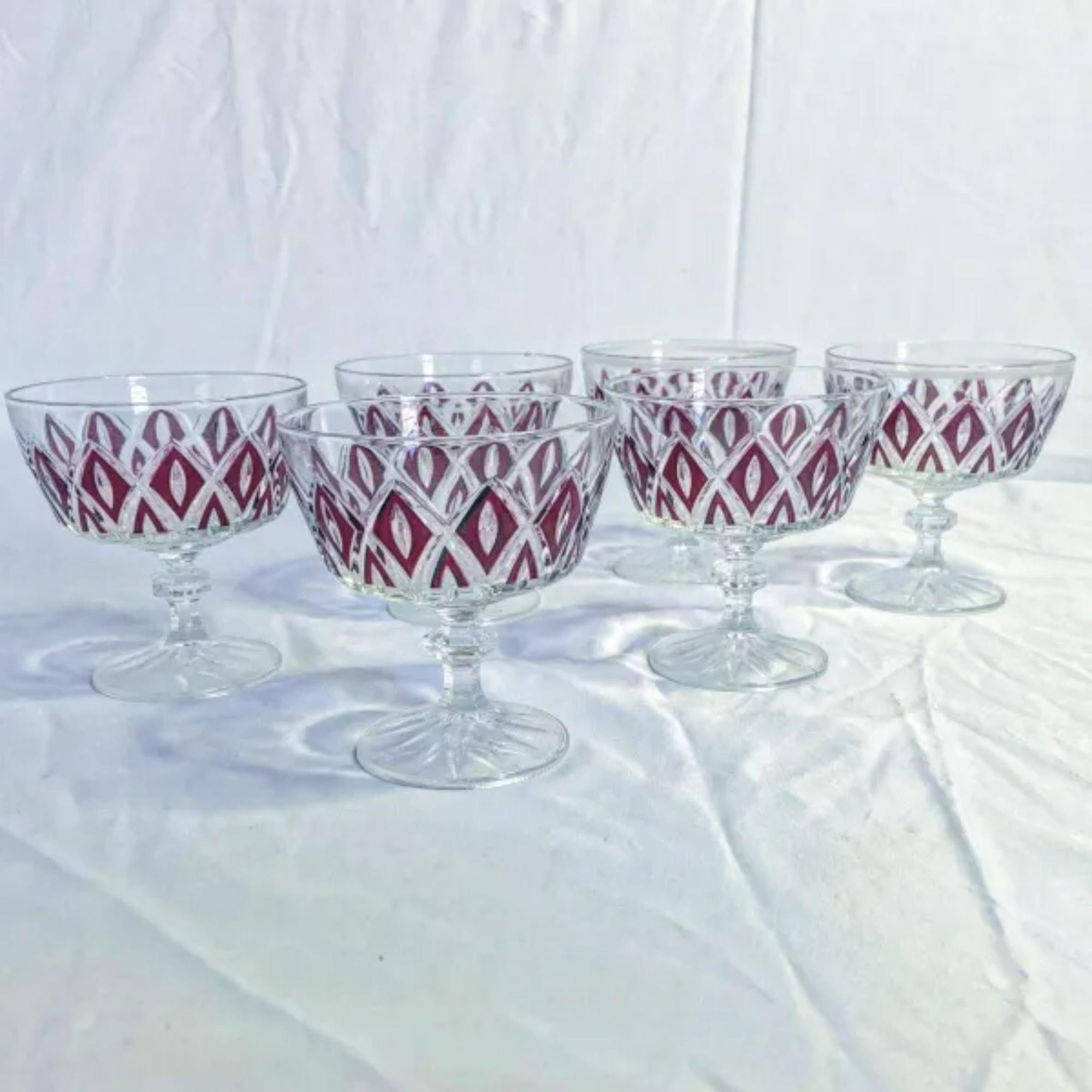 Red Diamond Sherbert Glasses by VMC Reims, 1950

Additional information: 
Material: Glass
Color: Red, Transparent
Style: Mid-Century, Mid-Century Modern, Vintage
Brand: VMC Reims
Time Period: 1950s
Place of origin: France
Dimension: 3.5” D