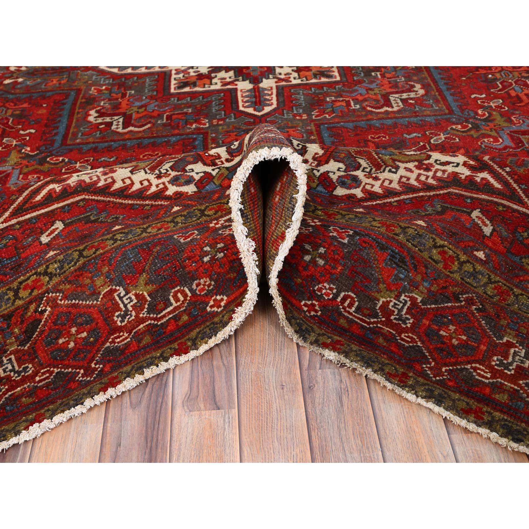 Mid-20th Century Red Distressed Feel Evenly Worn Pure Wool Hand Knotted Vintage Persian Heriz Rug For Sale