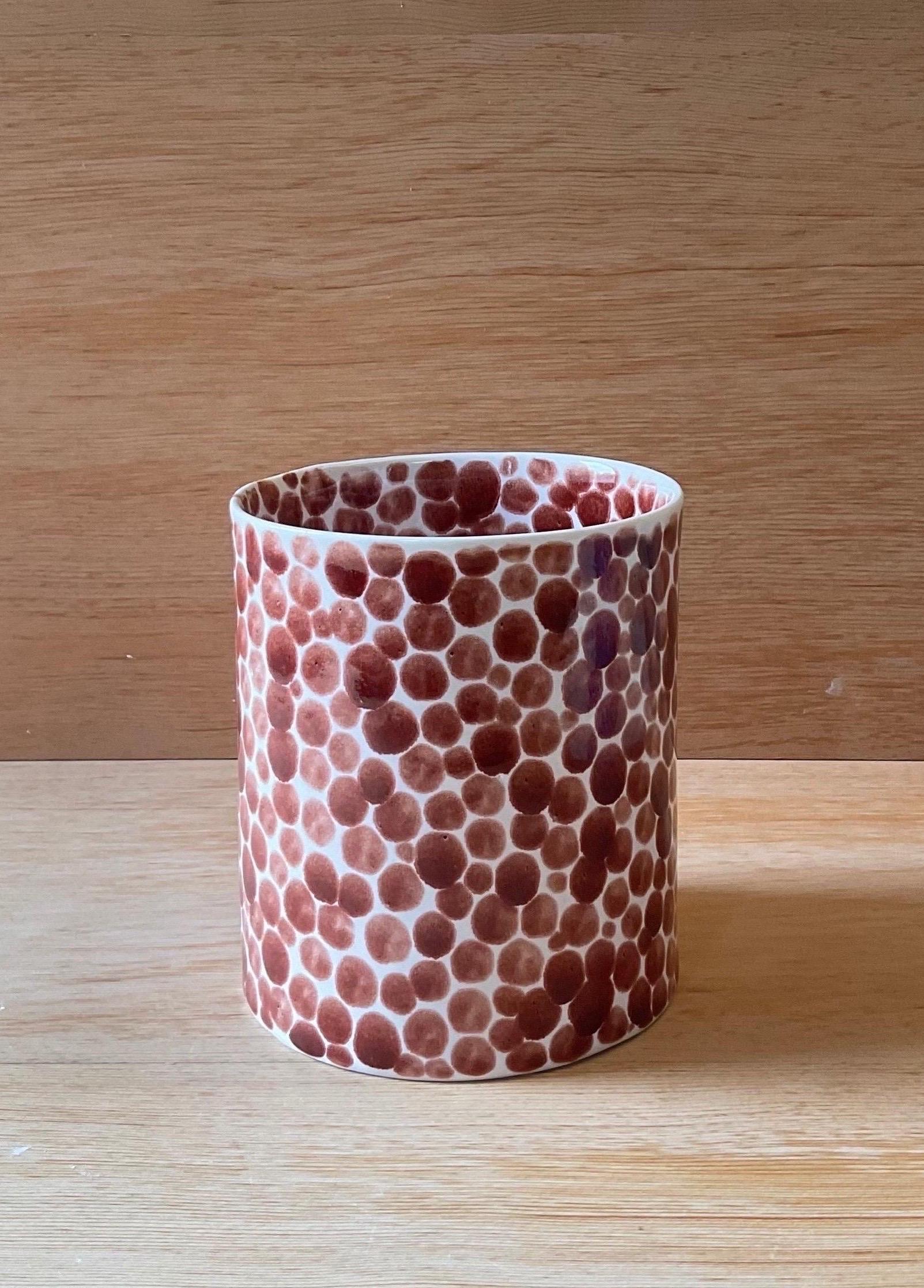 Porcelain vase with luminous white glaze hand-painted with red dots.
 Measures: 4.5