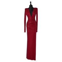 Robe de soirée drapée rouge avec décolleté en V profond ALEXANDRE VAUTHIER