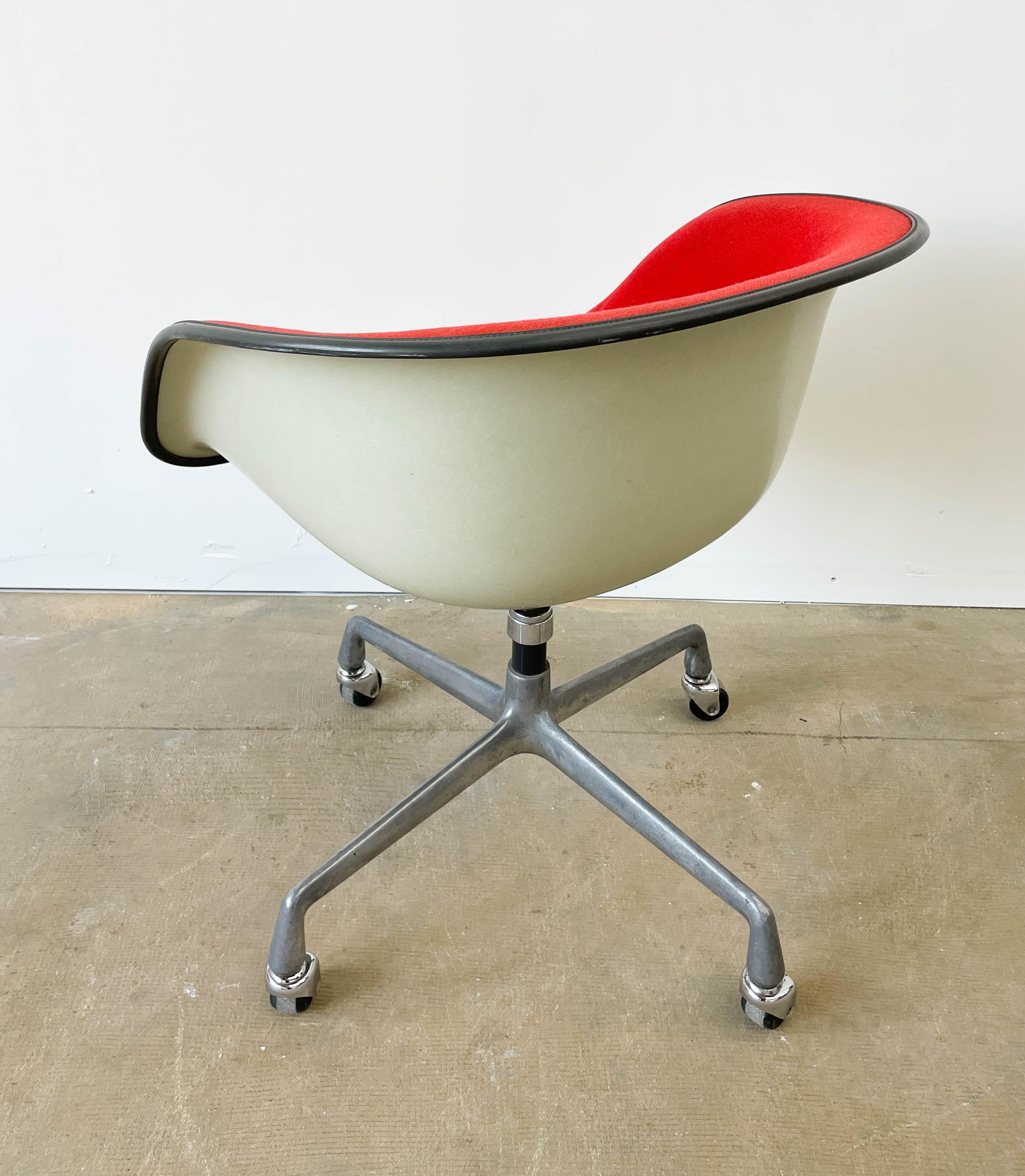 American Red Eames Lowback Swivel Armchair