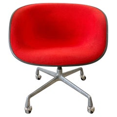 Red Eames Lowback Swivel Armchair