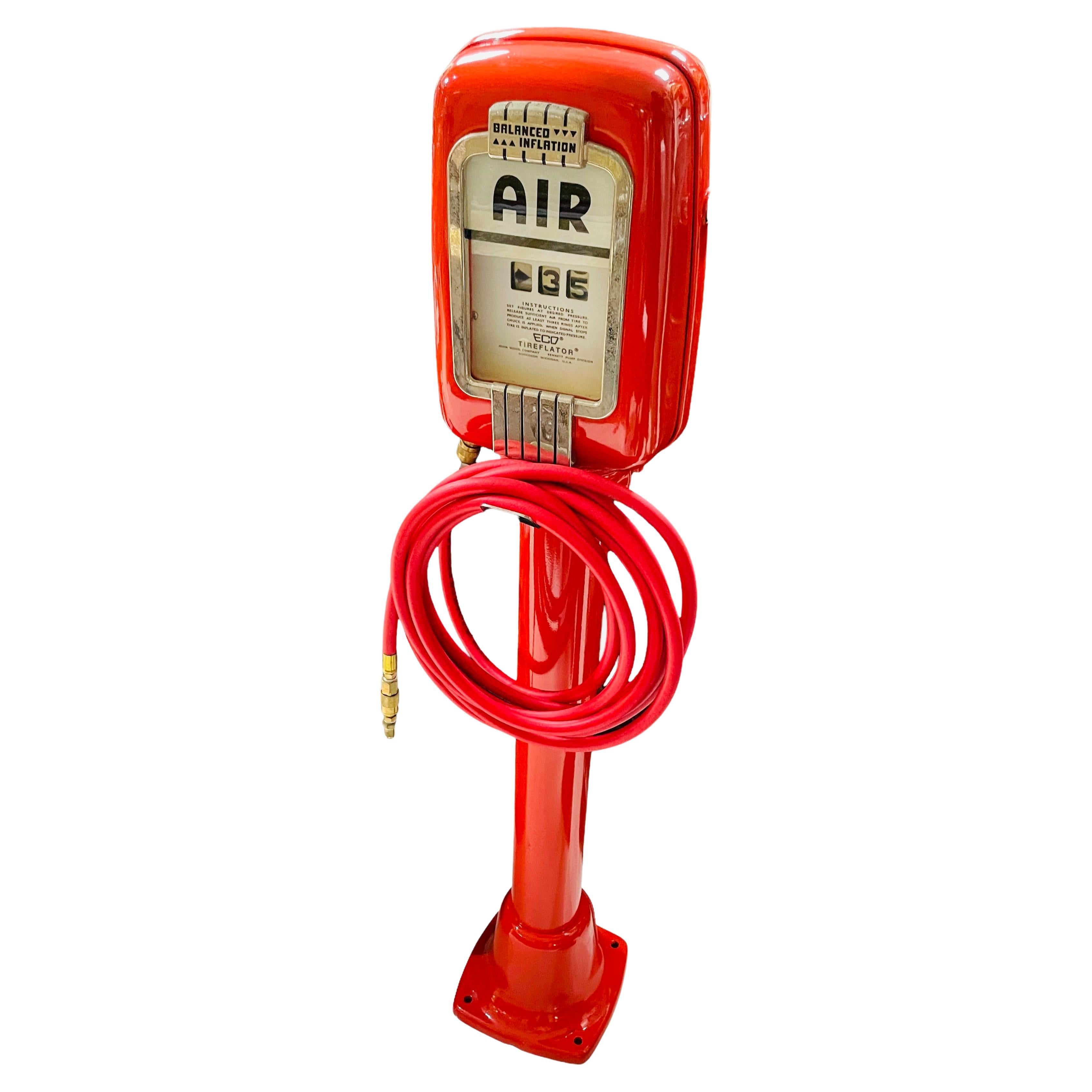 This is an Eco air meter model 98 pedestal mounted. It is painted ruby red. It meters the air. It operates by air pressure, not electricity. It is also lighted. This model is no longer being made, but it was made by John Wood Company in Michigan.